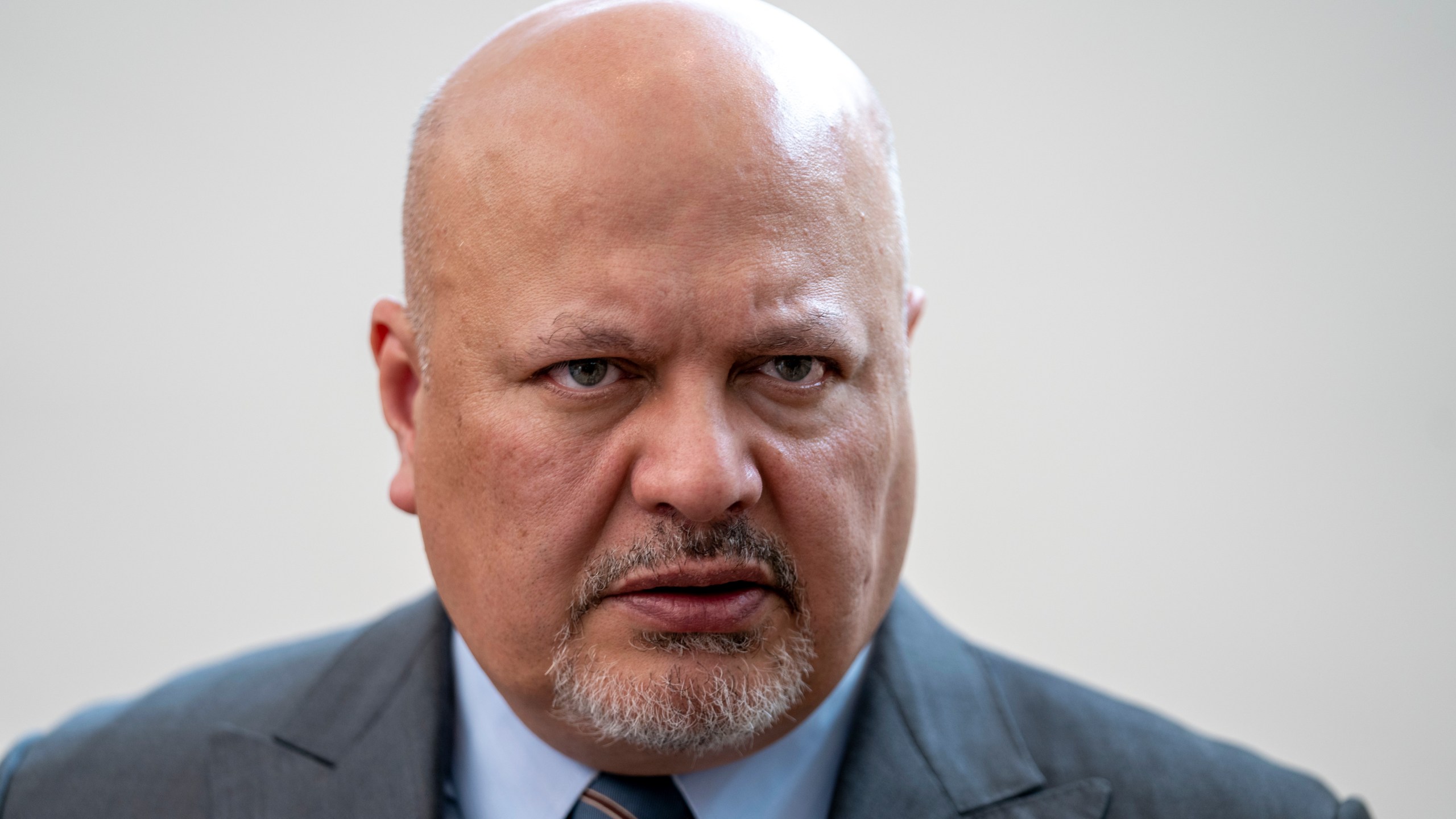 FILE - Karim Khan, Prosecutor of the International Criminal Court looks up prior to a press conference in The Hague, Netherlands, Monday, July 3, 2023. (AP Photo/Peter Dejong, File)