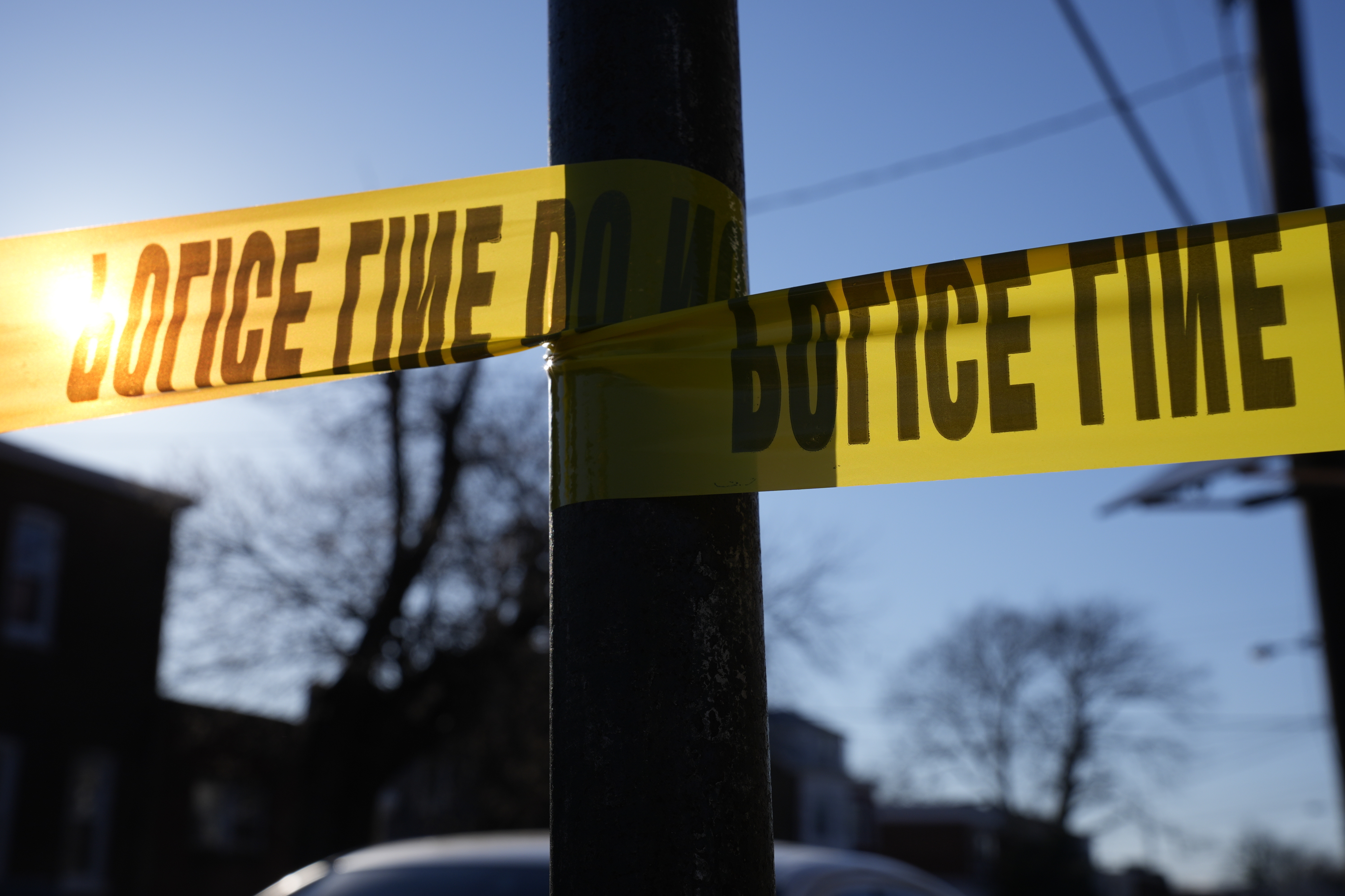 FILE - Tape cordons off a scene of police activity, Saturday, March 16, 2024, in Trenton, N.J. (AP Photo/Matt Rourke, File)