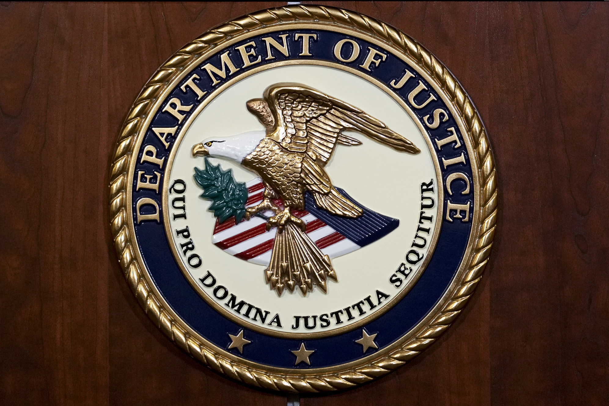 FILE - The seal of the Department of Justice is pictured, Aug. 1, 2023, in Washington. (AP Photo/J. Scott Applewhite, File)