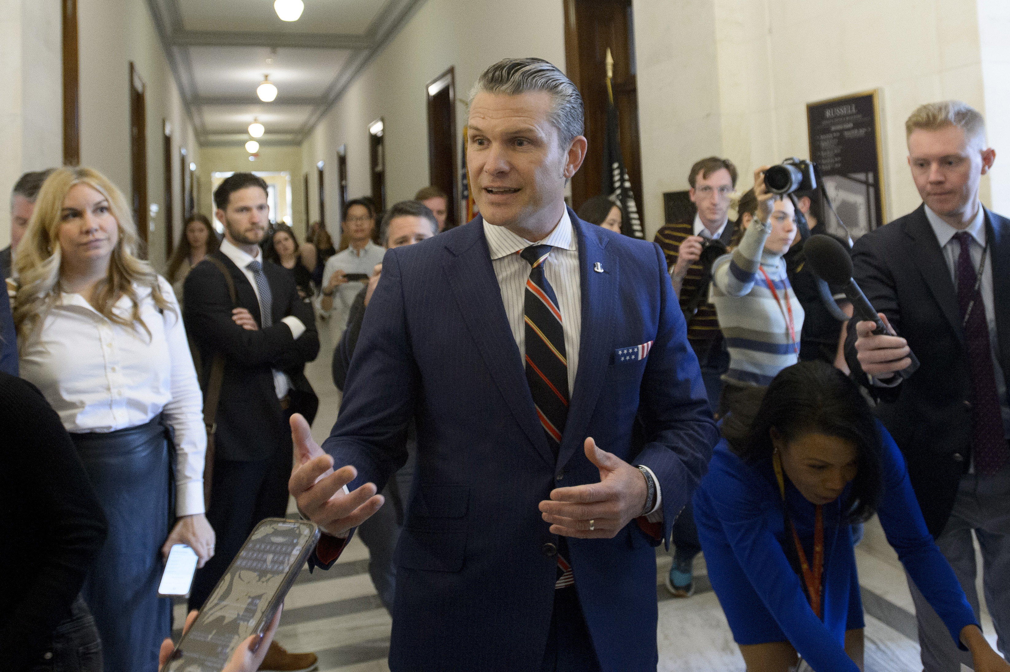 Pete Hegseth, President-elect Donald Trump's pick for secretary of defense, speaks with reporters following a meeting with senators on Capitol Hill, Thursday, Nov. 21, 2024, in Washington. (AP Photo/Rod Lamkey, Jr.)