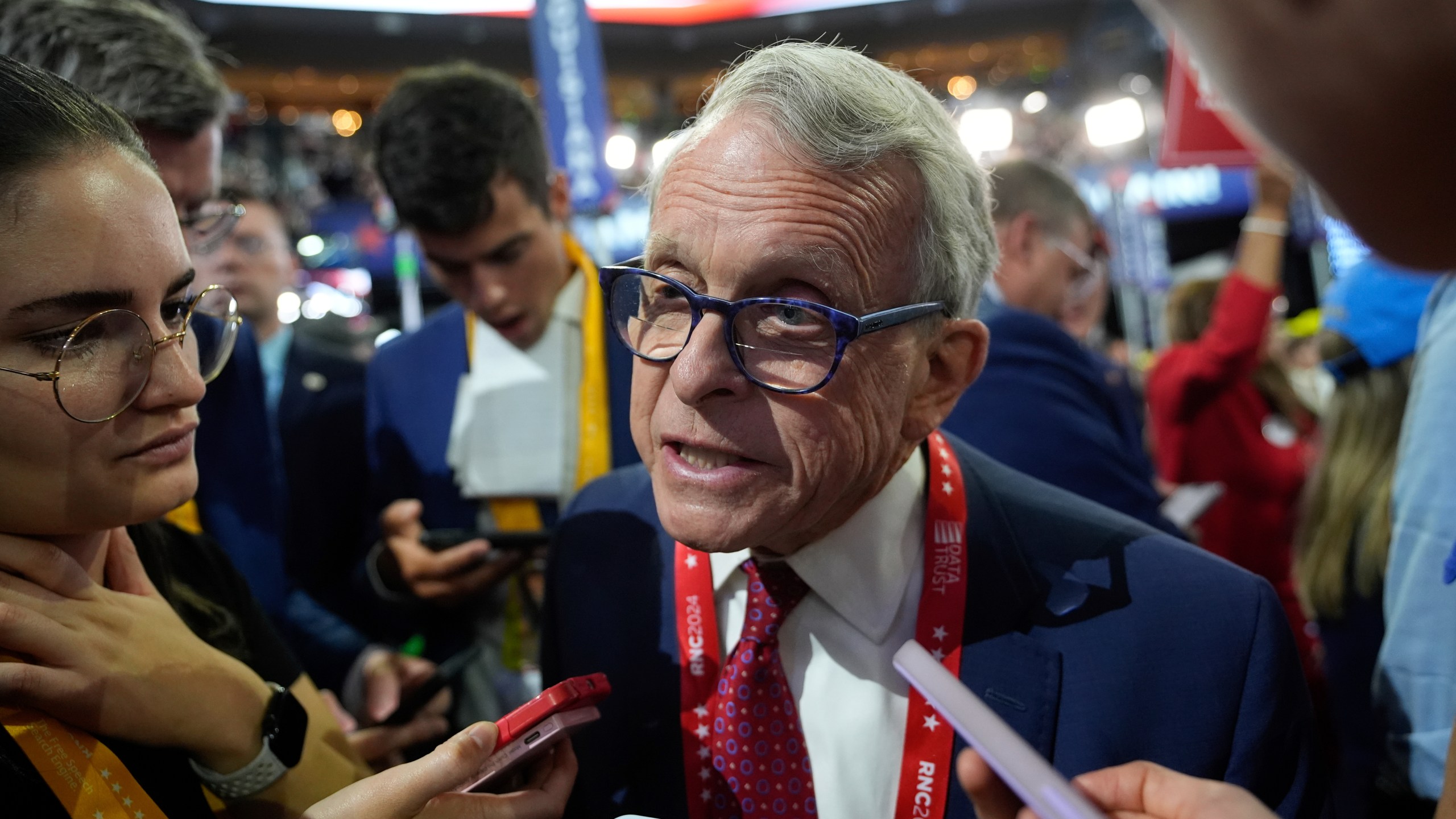 FILE - Ohio Gov. Mike DeWine talks to reporters during the Republican National Convention July 15, 2024, in Milwaukee. (AP Photo/Paul Sancya, File)