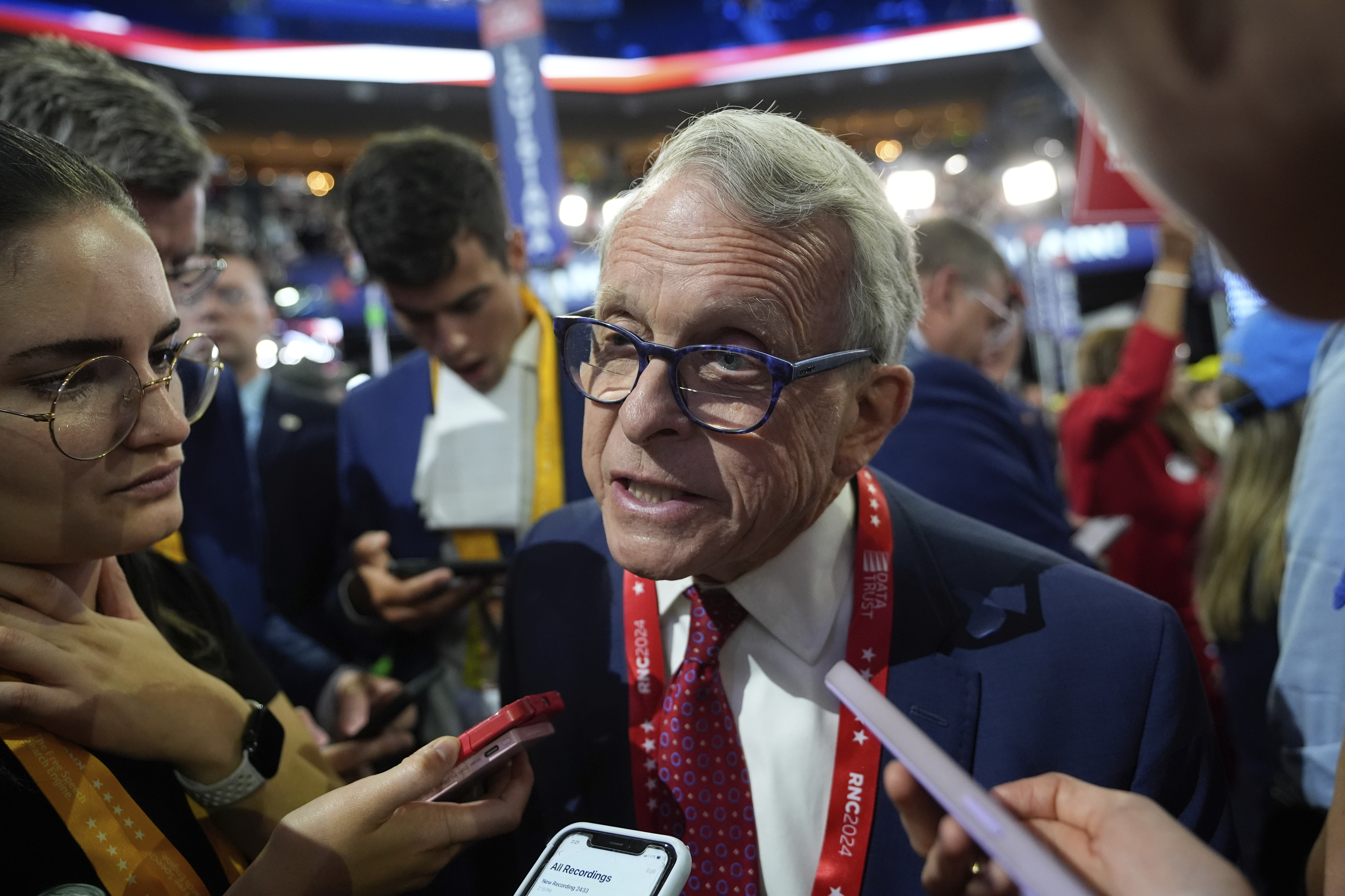 FILE - Ohio Gov. Mike DeWine talks to reporters during the Republican National Convention July 15, 2024, in Milwaukee. (AP Photo/Paul Sancya, File)