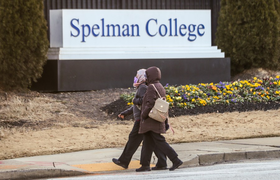 FILE - People walk outside the Spelman campus, Feb. 1, 2022, in Atlanta. (John Spink/Atlanta Journal-Constitution via AP, File)