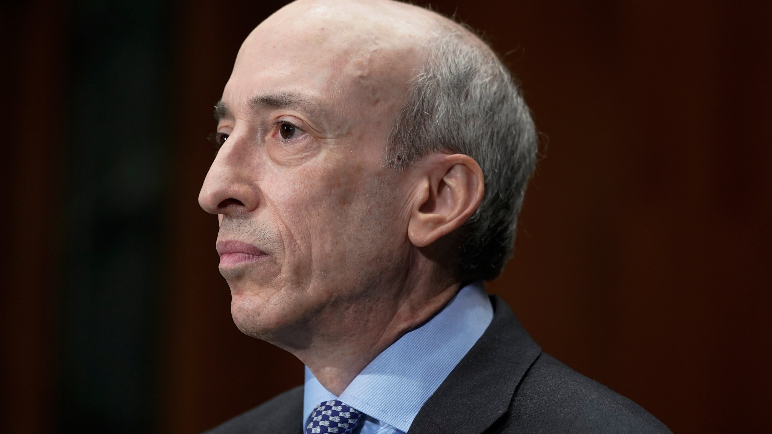 FILE - Securities and Exchange Commission Chair Gary Gensler listens during a Senate Banking Committee Hybrid hearing on 'Oversight of the U.S. Securities and Exchange Commission," on Sept. 12, 2023, on Capitol Hill in Washington. (AP Photo/Mariam Zuhaib, File)