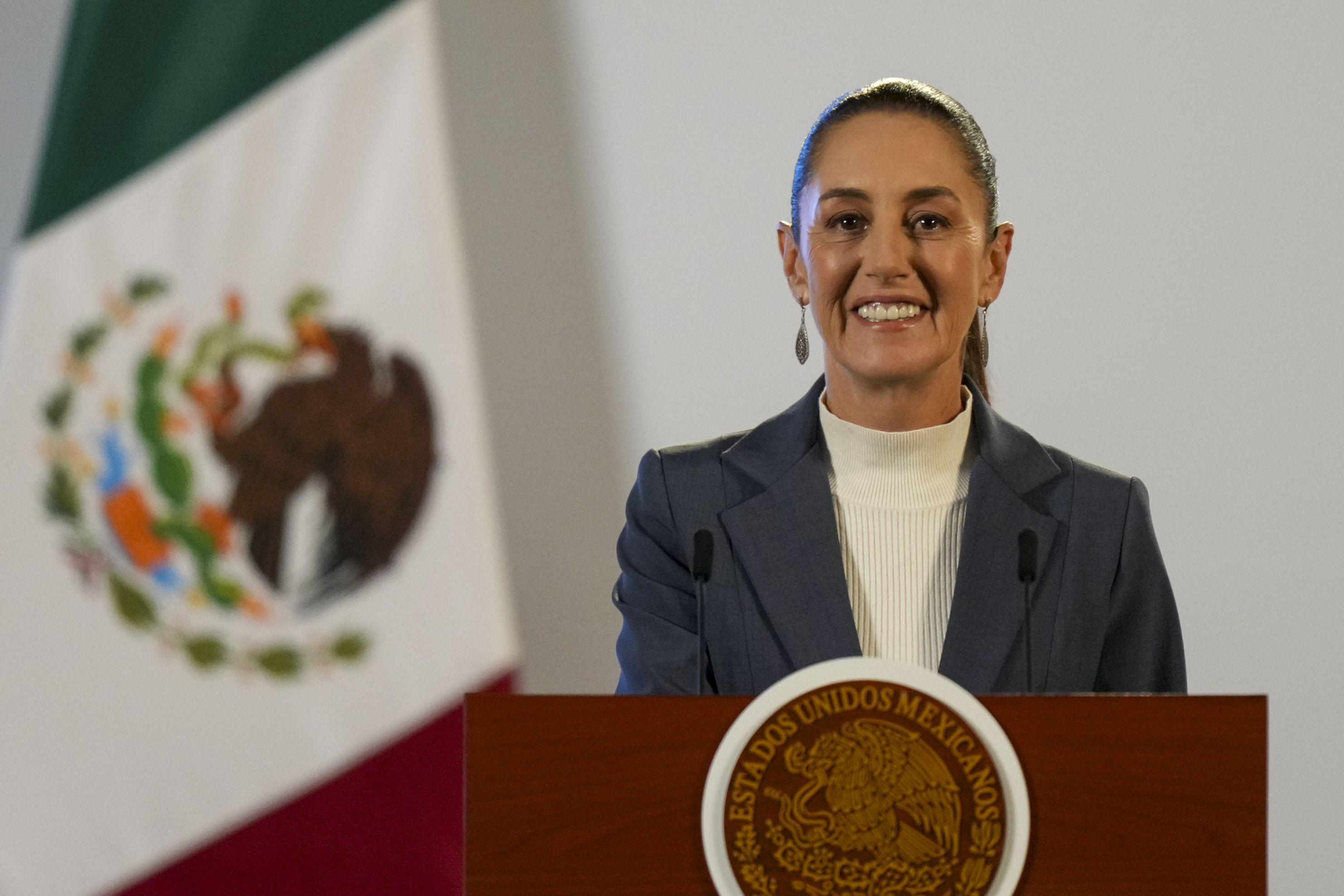 FILE - Mexican President Claudia Sheinbaum gives a media briefing from the National Palace in Mexico City, Oct. 2, 2024, the morning after her inauguration. (AP Photo/Fernando Llano, File)