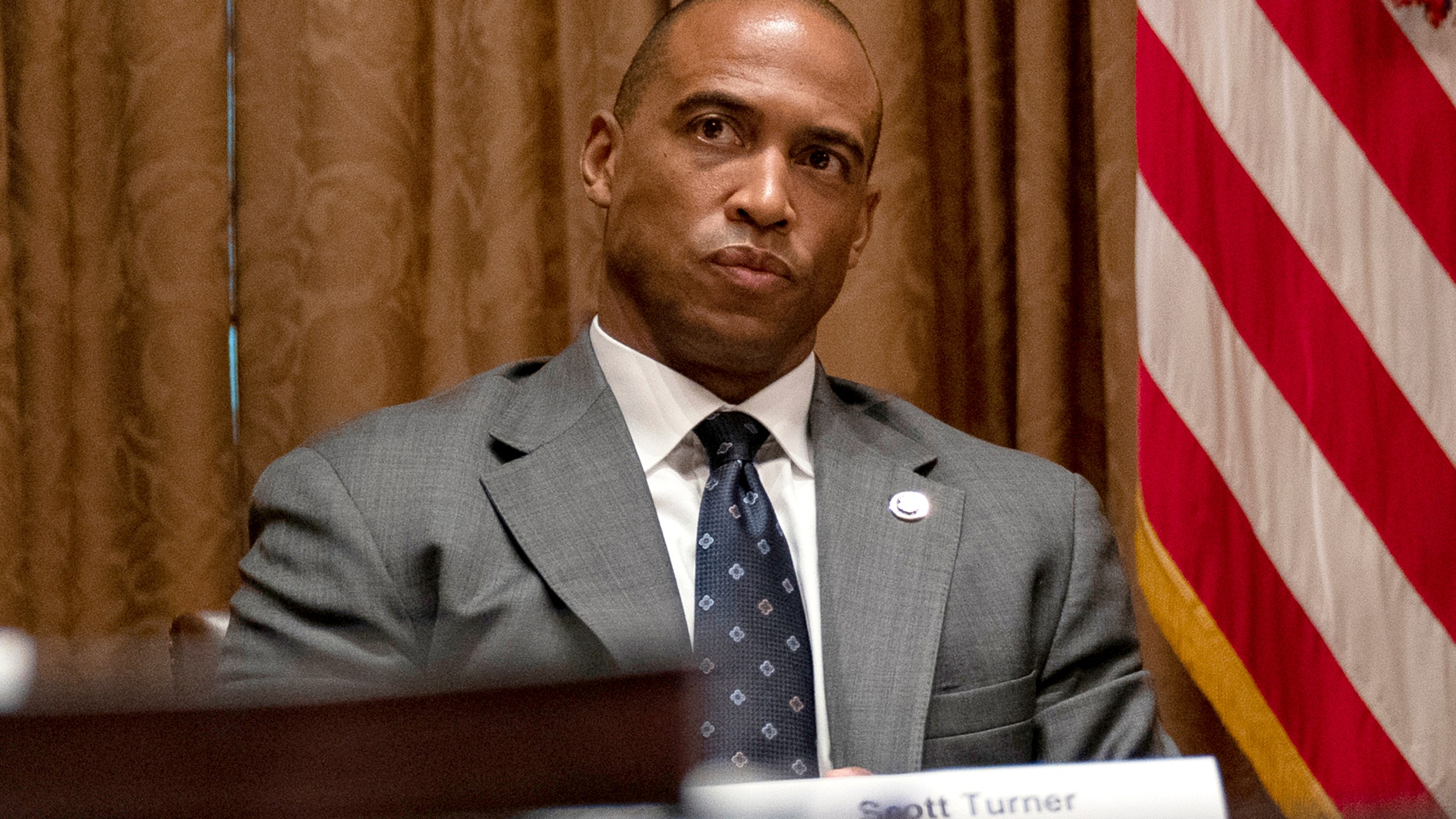 FILE - Scott Turner, the executive director of the White House Opportunity and Revitalization Council, attends a meeting in the Cabinet Room of the White House, May 18, 2020, in Washington. (AP Photo/Evan Vucci, File)