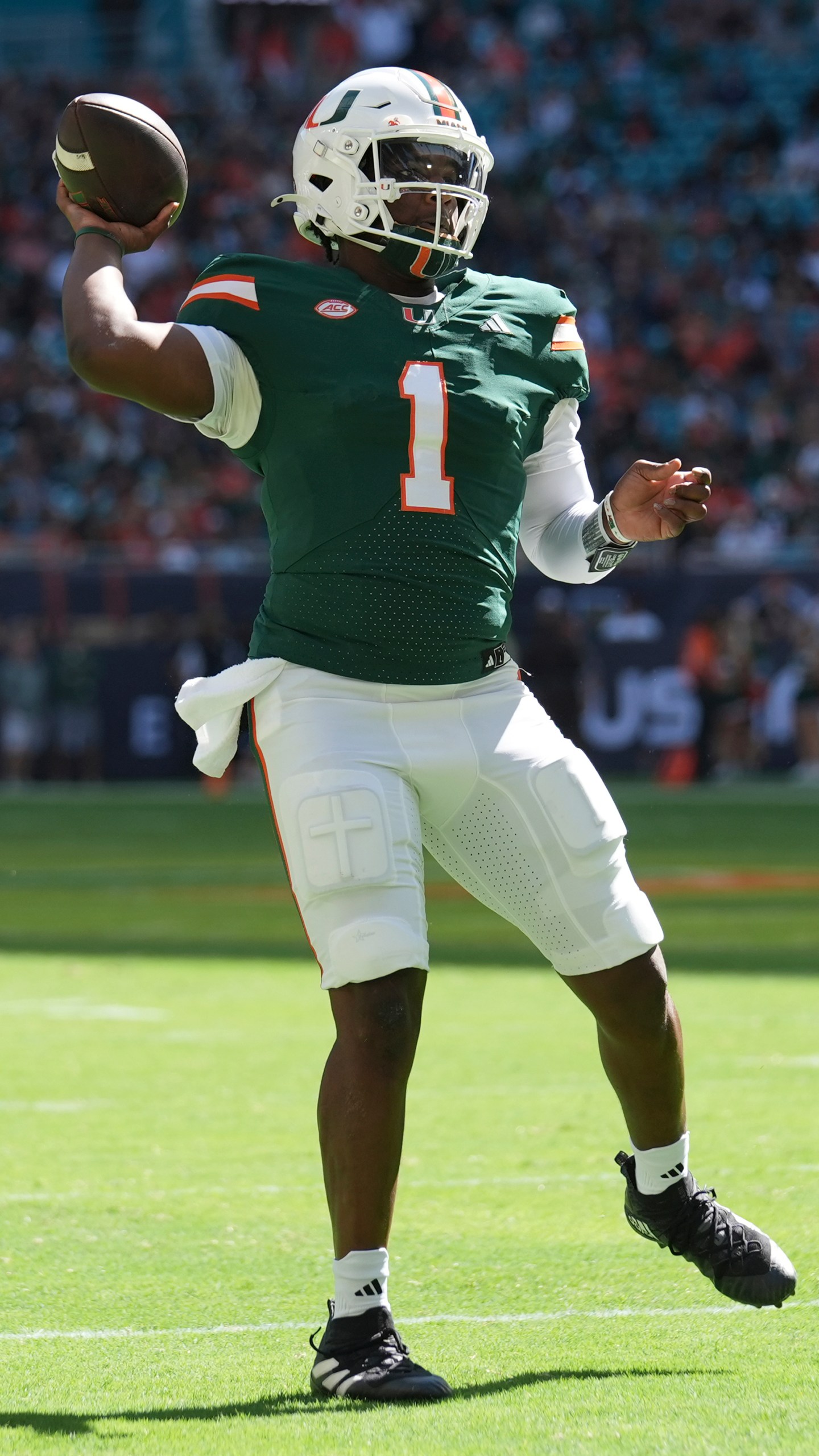 Miami quarterback Cam Ward (1) looks to pass during the first half of an NCAA college football game against Wake Forest, Saturday, Nov. 23, 2024, in Miami Gardens, Fla. (AP Photo/Lynne Sladky)