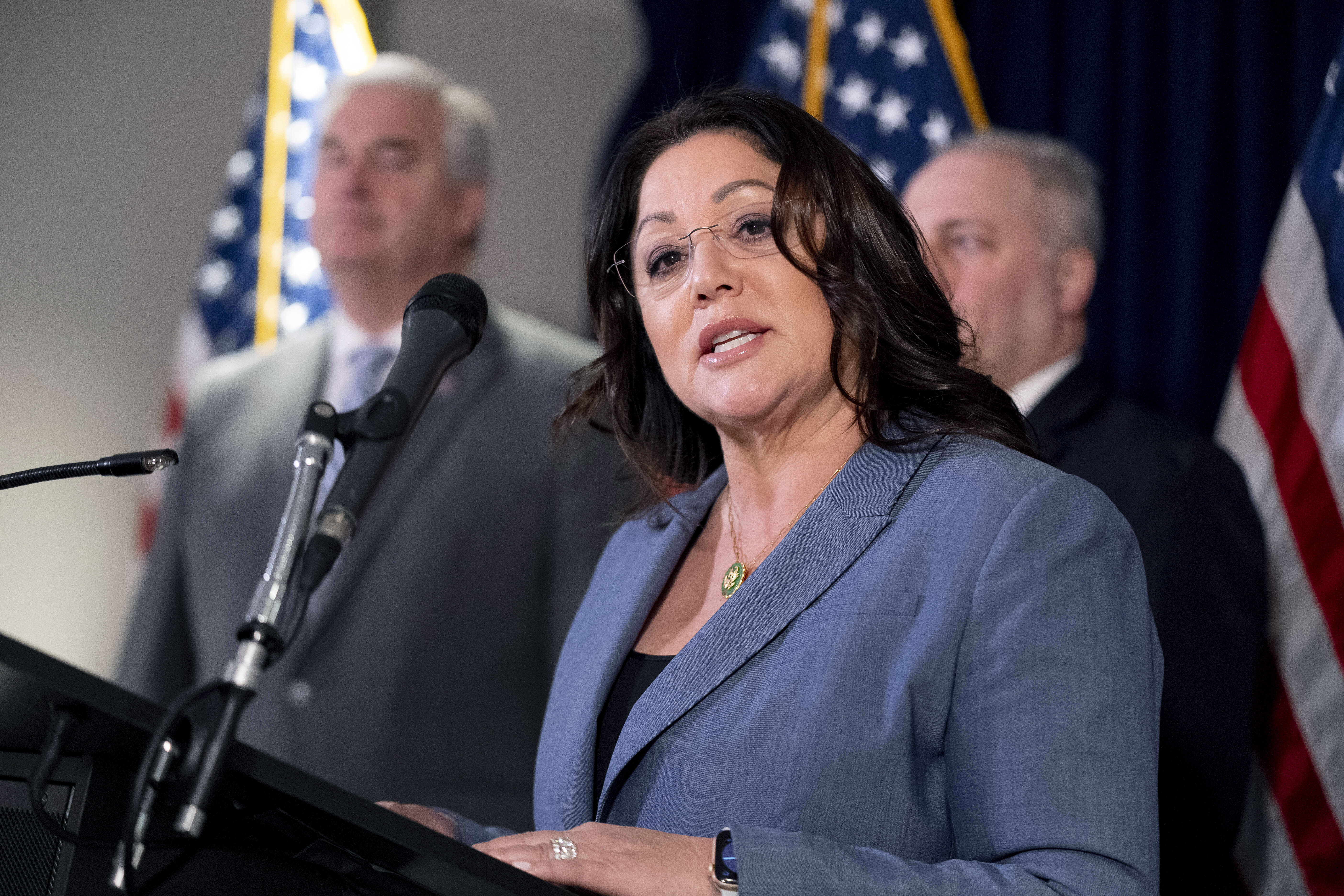 FILE - Rep. Lori Chavez-DeRemer, R-Ore., accompanied by Majority Whip Rep. Tom Emmer, R-Minn., left, and House Majority Leader Rep. Steve Scalise, R-La., right, speaks at a news conference on Capitol Hill in Washington, Jan. 25, 2023. (AP Photo/Andrew Harnik, File)