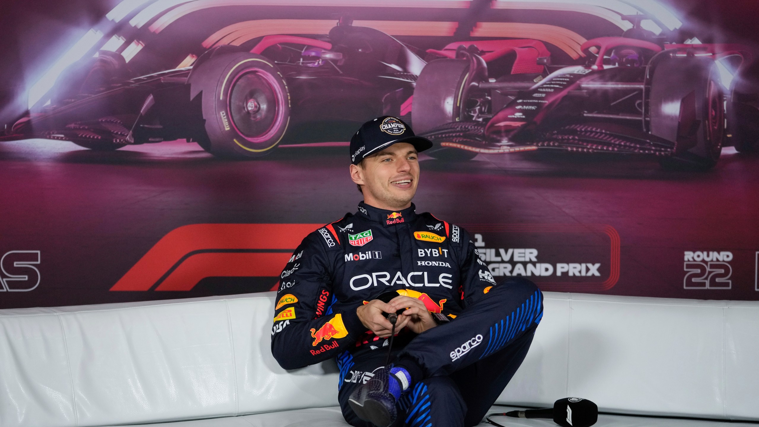 Red Bull driver Max Verstappen, of the Netherlands, conducts an interview after the F1 Las Vegas Grand Prix auto race, Sunday, Nov. 24, 2024, in Las Vegas. (AP Photo/Matt York)