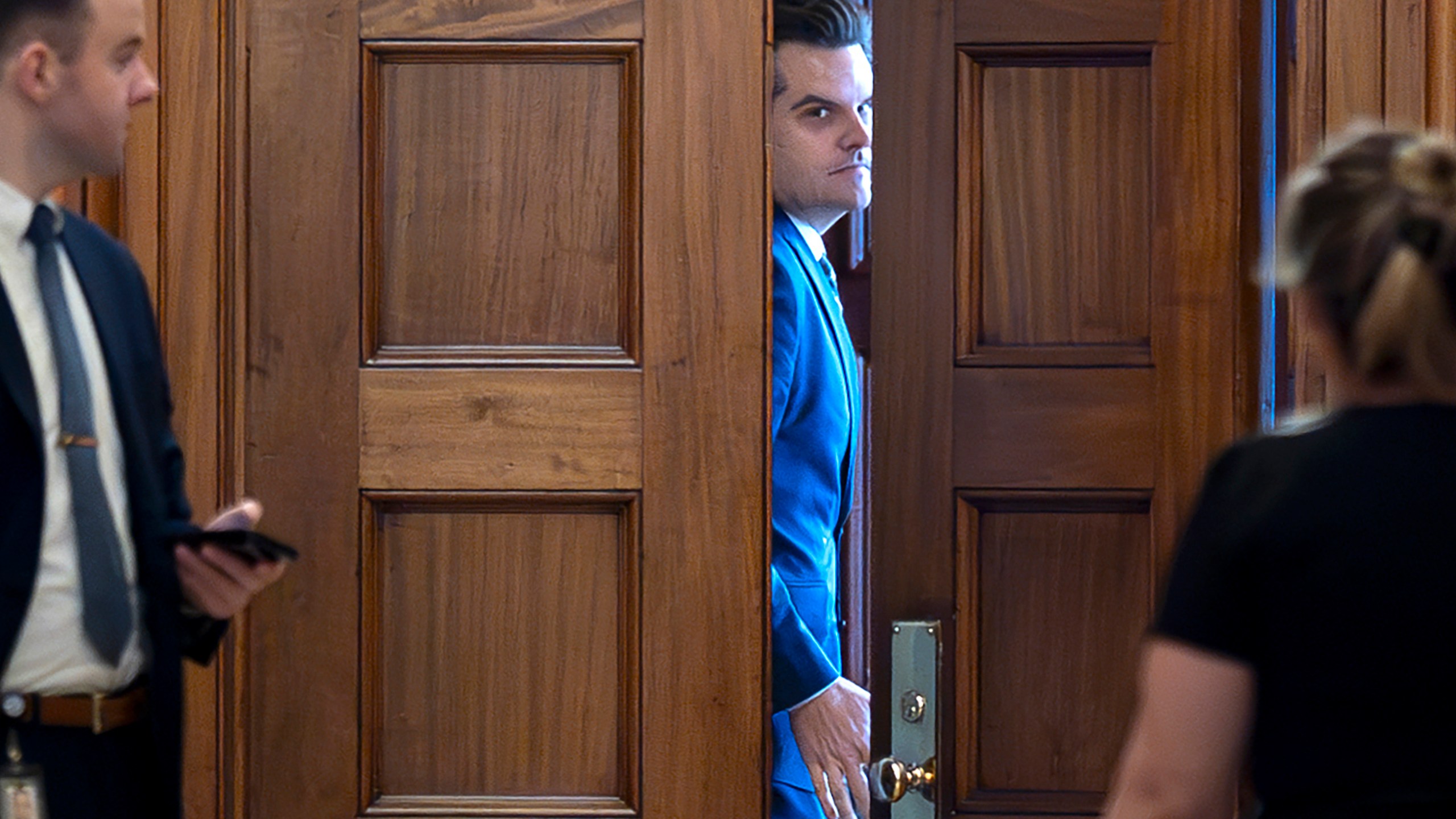 FILE - President-elect Donald Trump's nominee to be attorney general, former Rep. Matt Gaetz, R-Fla., closes a door to a private meeting with Vice President-elect JD Vance and Republican Senate Judiciary Committee members, at the Capitol in Washington, Nov. 20, 2024. (AP Photo/J. Scott Applewhite, File)