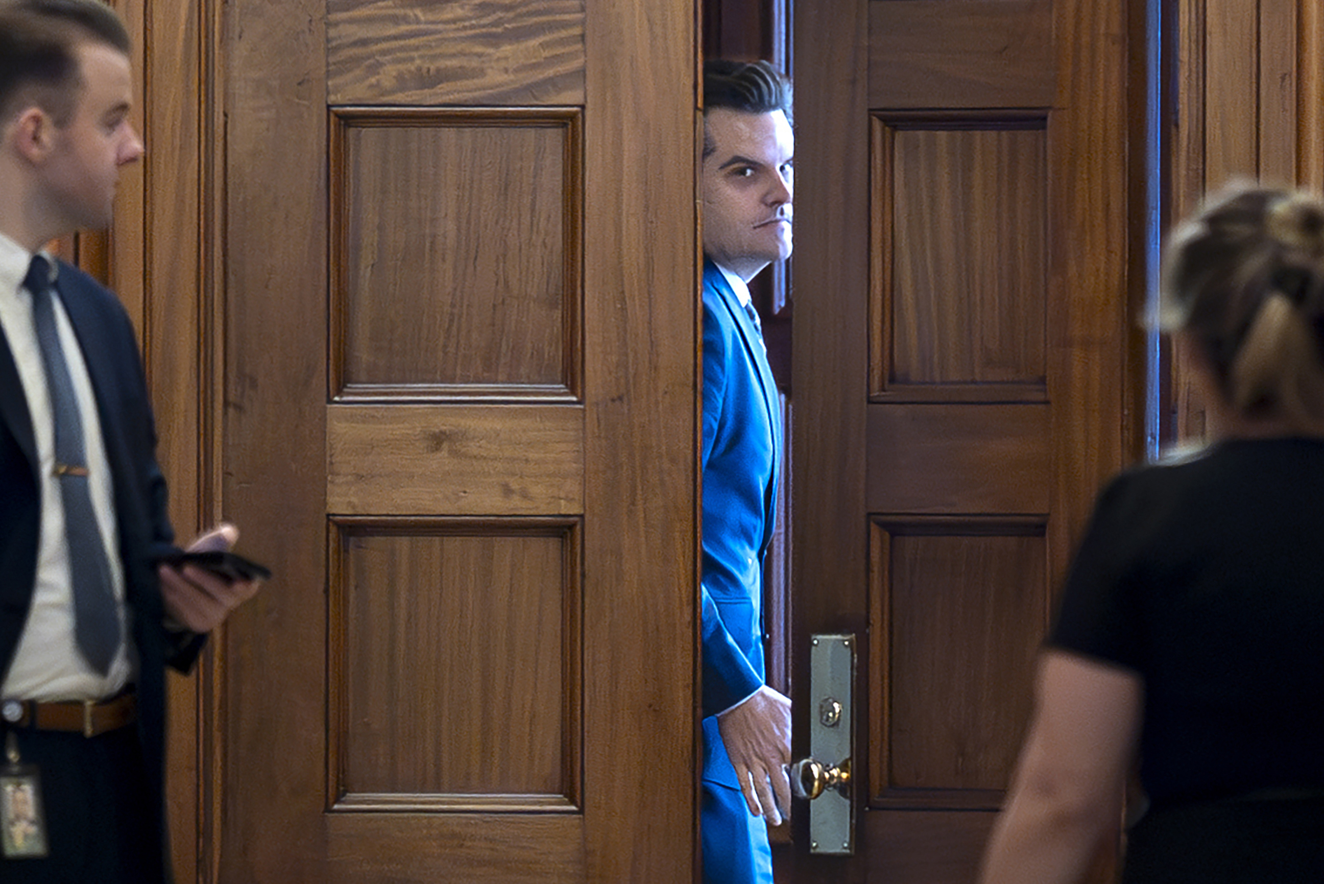 FILE - President-elect Donald Trump's nominee to be attorney general, former Rep. Matt Gaetz, R-Fla., closes a door to a private meeting with Vice President-elect JD Vance and Republican Senate Judiciary Committee members, at the Capitol in Washington, Nov. 20, 2024. (AP Photo/J. Scott Applewhite, File)