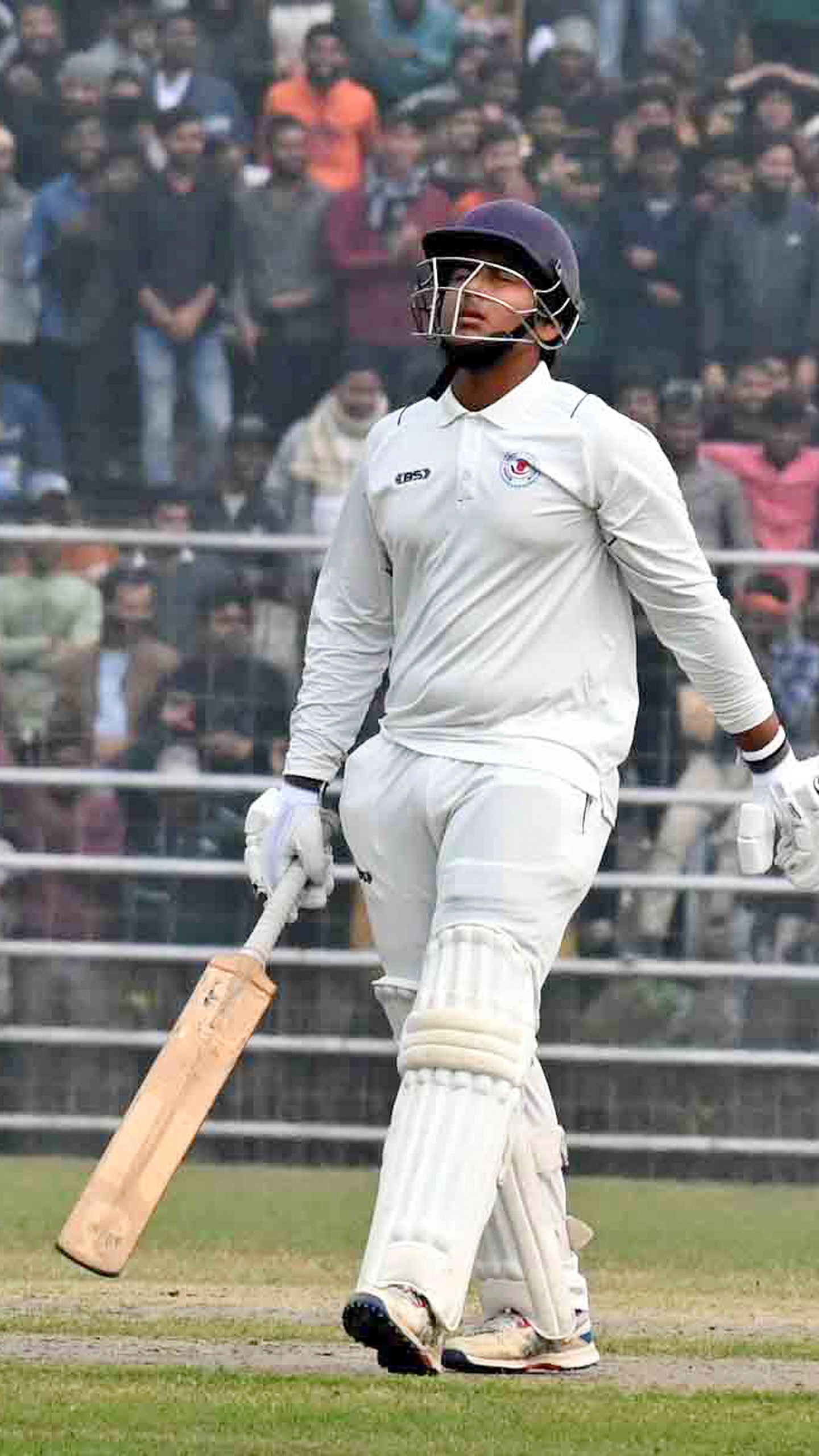 CAPTION CORRECTS BYLINE - Vaibhav Suryavanshi, one the the youngest Indian cricket player to earn an Indian Premier League contract after Rajasthan Royals (RR) signed for approximately Indian rupees 1.10 crore or USD $ 130481, walks to bat during local Ranji Trophy cricket league, in Patna, India, Saturday, Jan. 6, 2024. (AP Photo/ Aftab Alam Siddiqui)