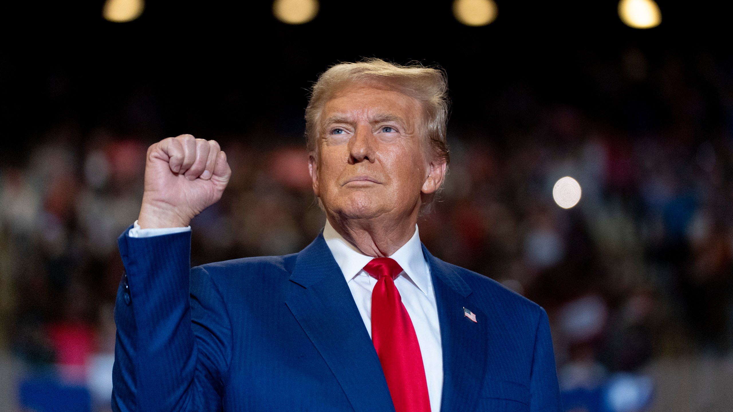 Republican presidential nominee former President Donald Trump pumps his fist as he arrives to speak at a campaign event at Nassau Coliseum, Wednesday, Sept.18, 2024, in Uniondale, N.Y. (AP Photo/Alex Brandon)