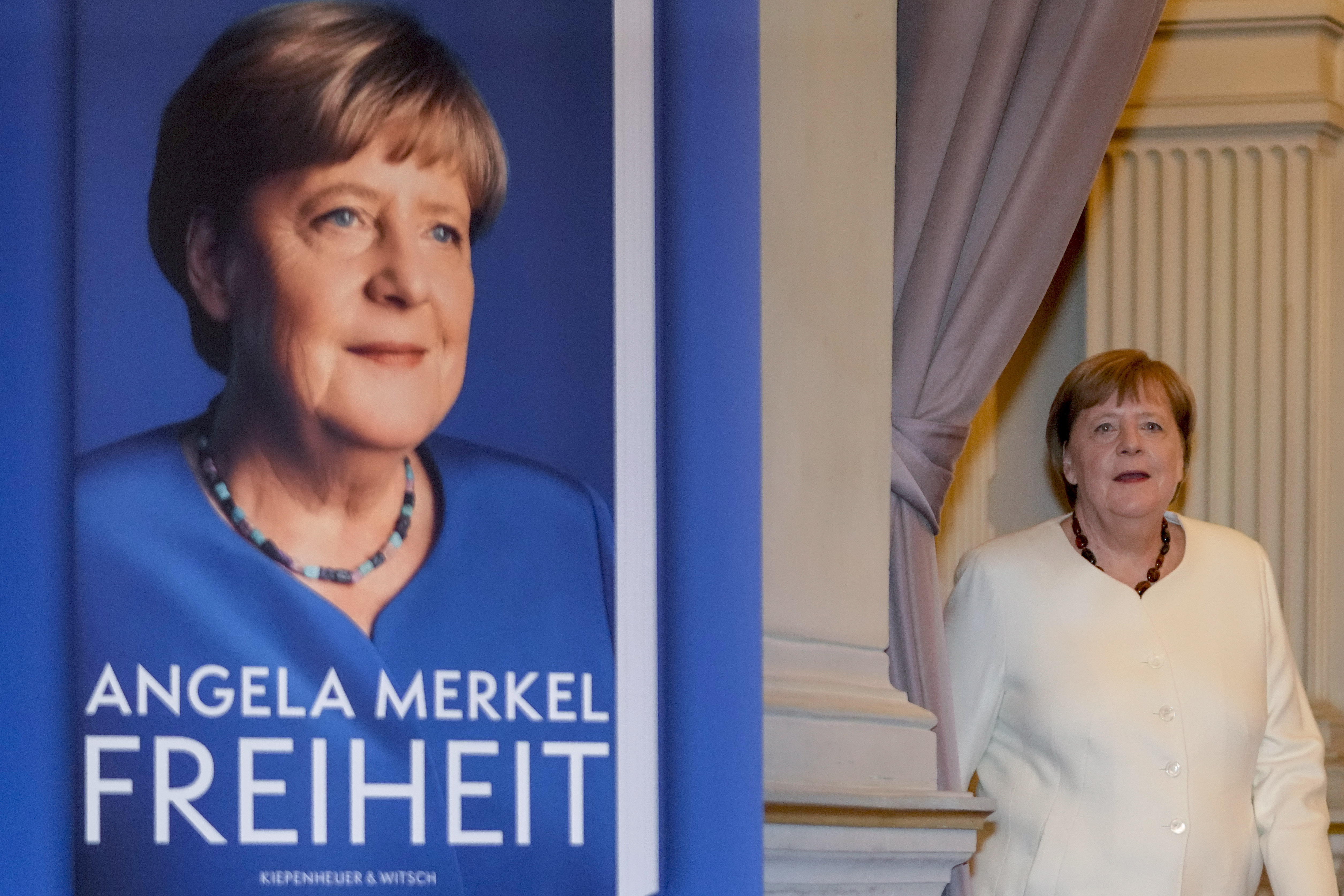 Former German Chancellor Angela Merkel arrives for the presentation of her memories in Berlin, Germany, Tuesday, Nov. 26, 2024. Book title reads "Freedom". (AP Photo/Markus Schreiber)