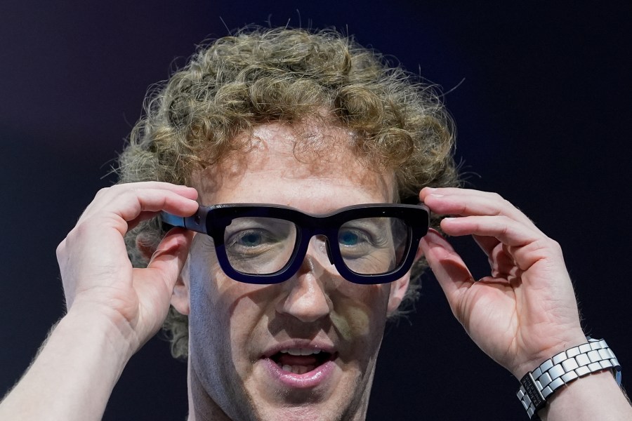 FILE - Mark Zuckerberg wears a pair of Orion AR glasses during the Meta Connect conference on Sept. 25, 2024, in Menlo Park, Calif. (AP Photo/Godofredo A. Vásquez, File)