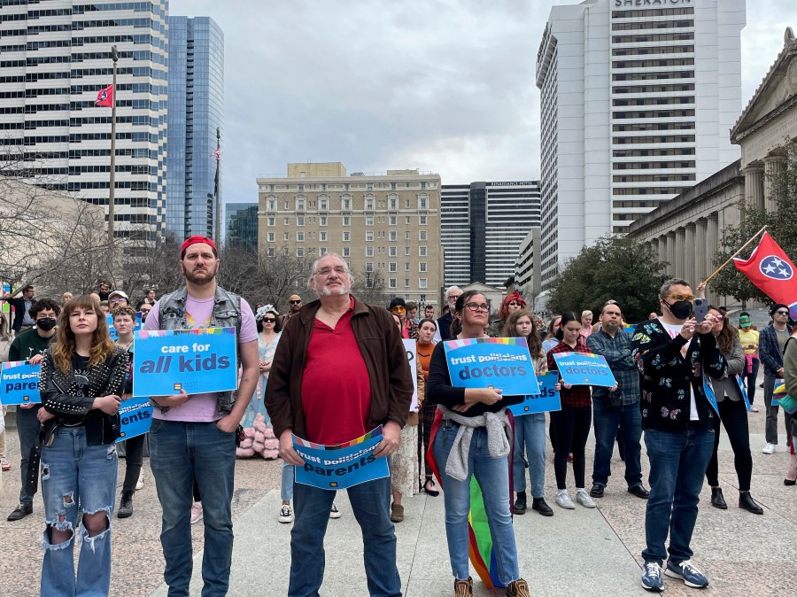 FILE - Advocates gather for a rally at the state Capitol complex in Nashville, Tenn., to oppose a series of bills that target the LGBTQ community, Feb. 14, 2023. (AP Photo/Jonathan Mattise, File)