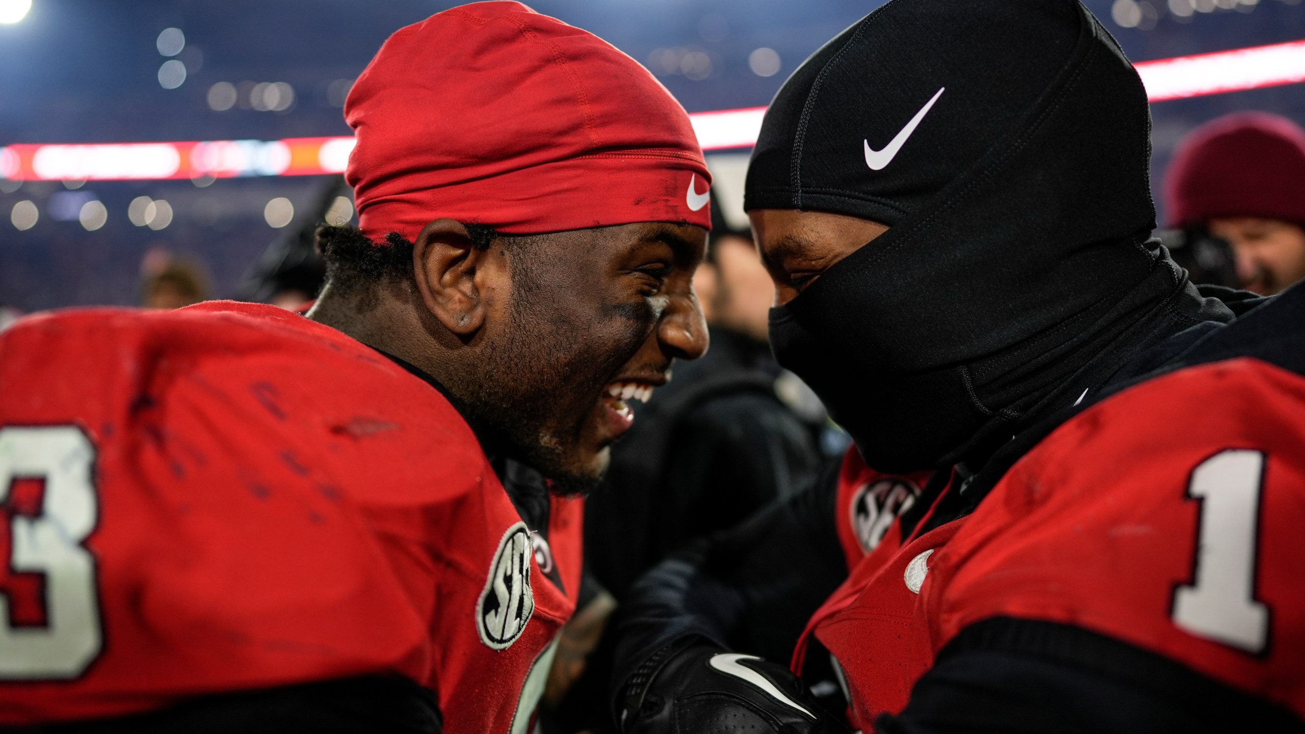 Georgia running back Nate Frazier (3) celebrates his game-winning score after eight overtimes in an NCAA college football game against Georgia Tech, Saturday, Nov. 30, 2024, in Athens, Ga. (AP Photo/Mike Stewart)