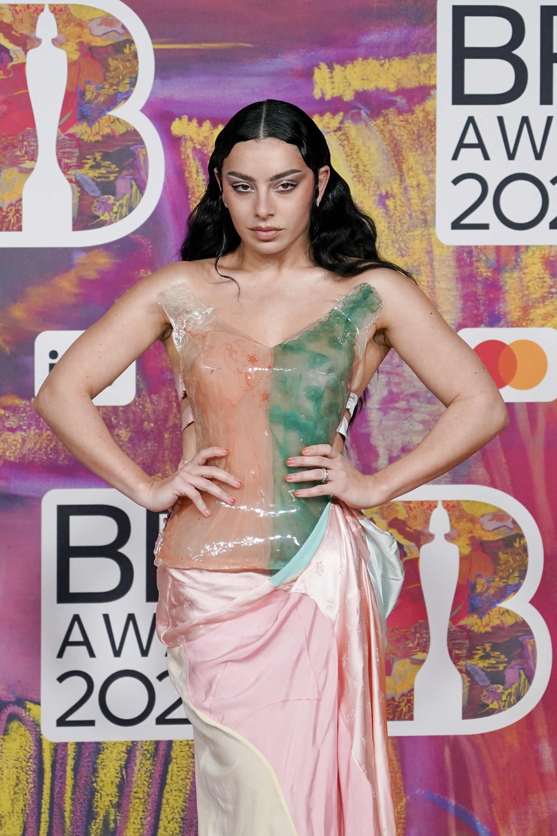 FILE - Charli XCX poses for photographers upon arrival at the Brit Awards 2024 in London, Saturday, March. 2, 2024. (Photo by Alberto Pezzali/Invision/AP, File)