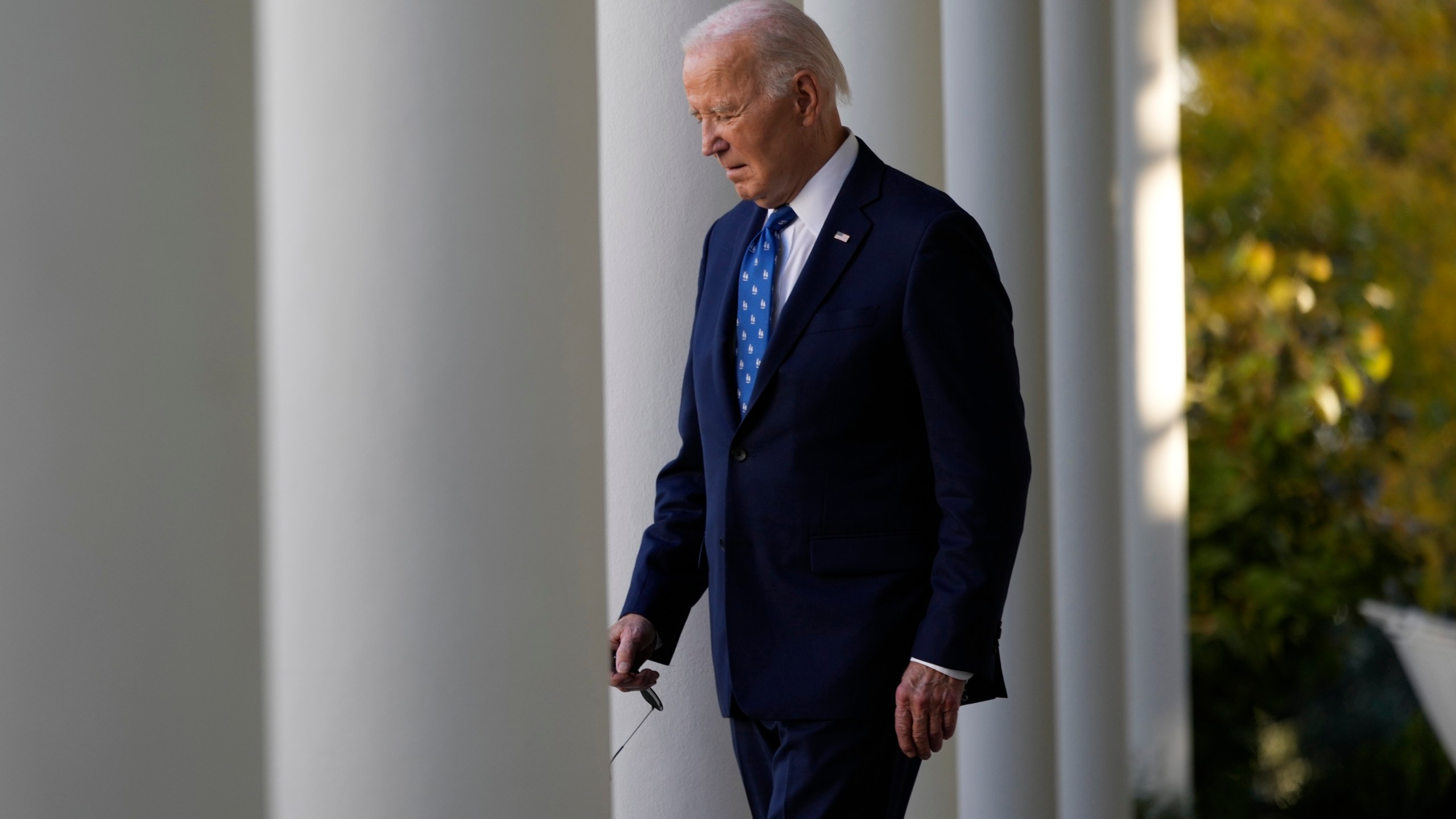 FILE - President Joe Biden walks out to speak in the Rose Garden of the White House in Washington, Nov. 26, 2024. (AP Photo/Ben Curtis, file)