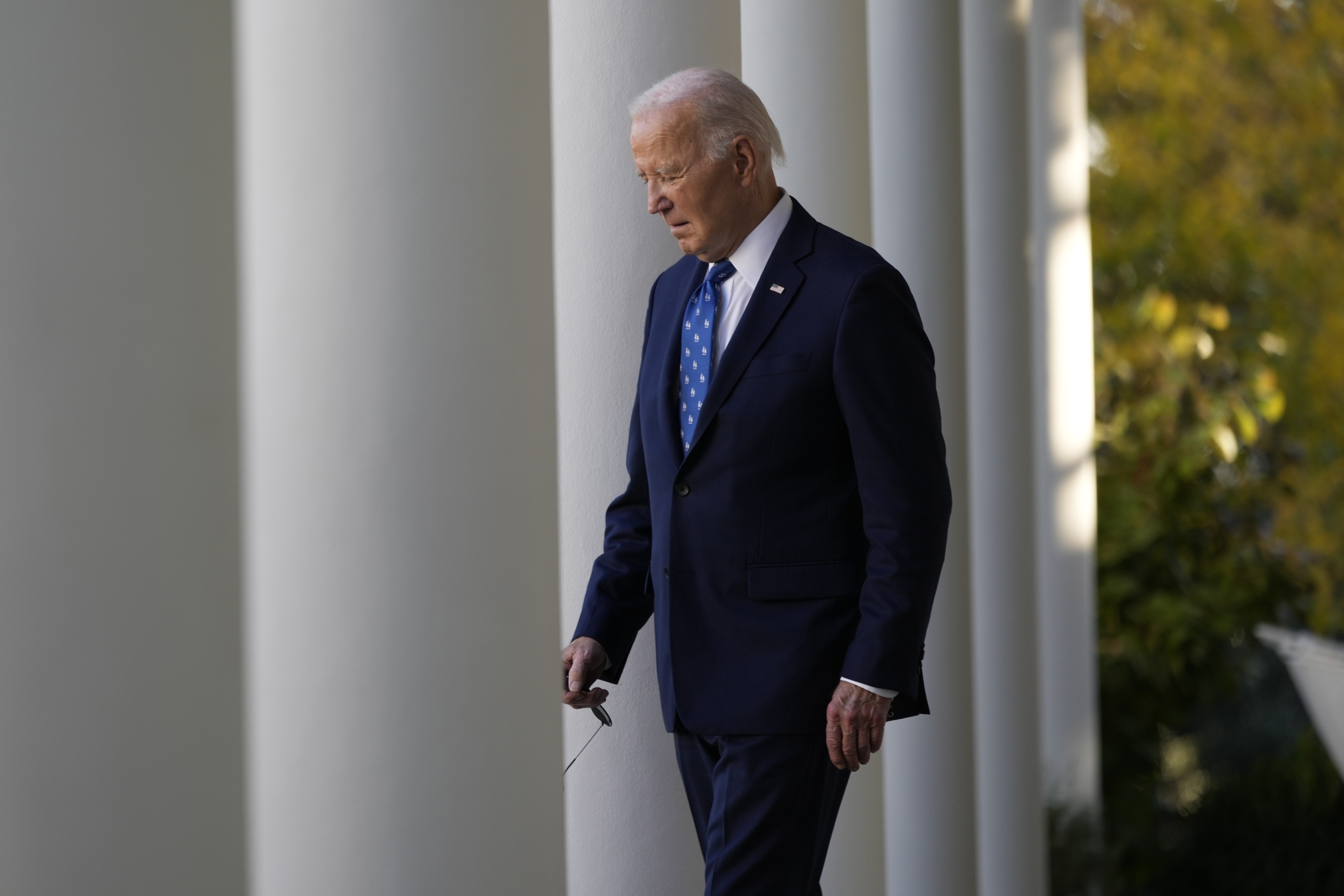 FILE - President Joe Biden walks out to speak in the Rose Garden of the White House in Washington, Nov. 26, 2024. (AP Photo/Ben Curtis, file)