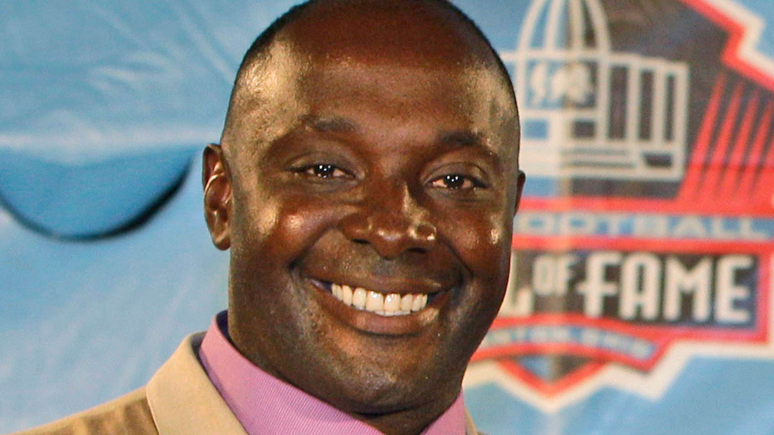 FILE - This is an Aug. 6, 2011 file photo showing Sterling Sharpe at the Pro Football Hall of Fame in Canton, Ohio. Sharpe was elected to the College Football Hall of Fame Thursday, May 22, 2014. (AP Photo/Tony Dejak, File)