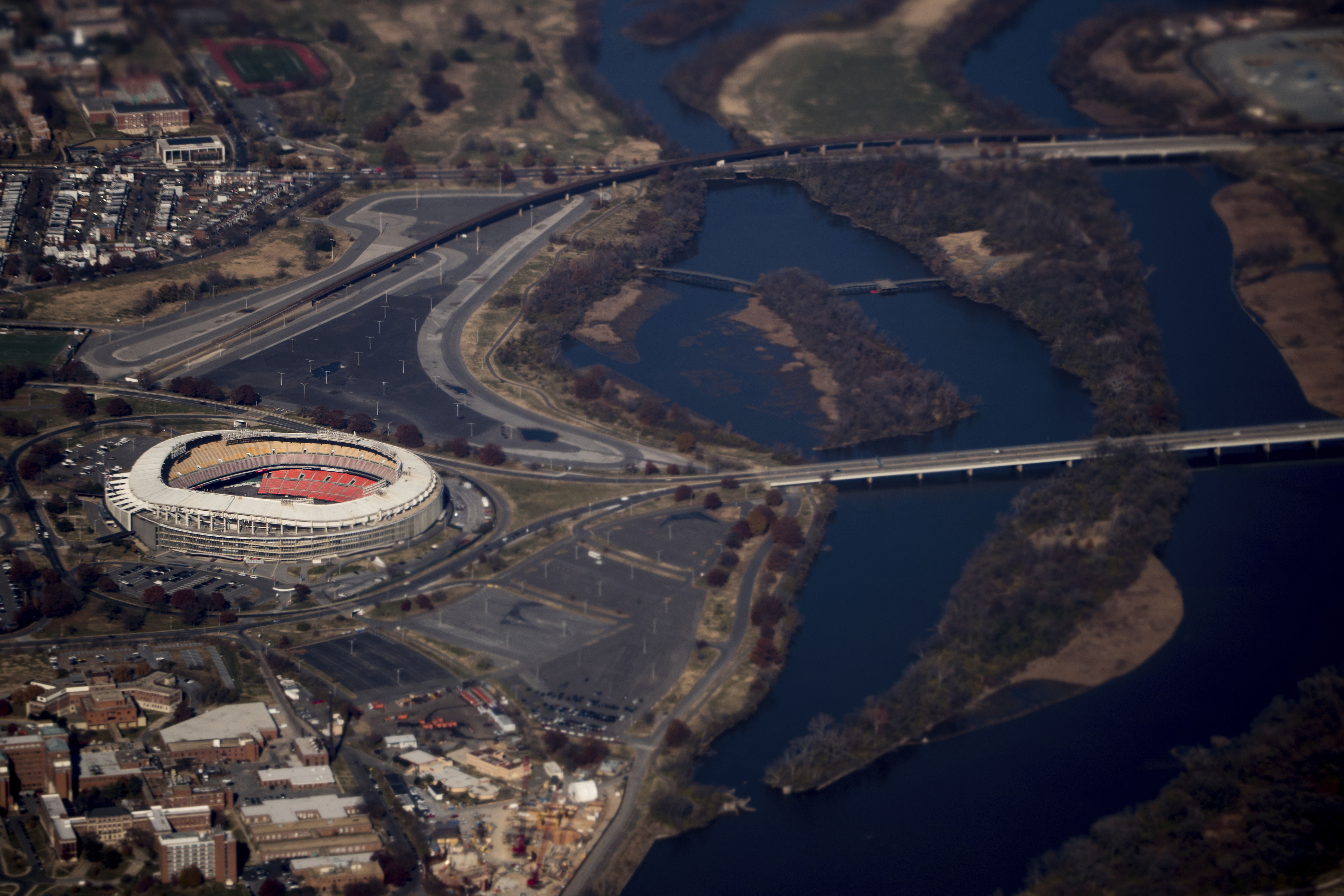 FILE - RFK Stadium is visible from Air Force One as it takes off from Andrews Air Force Base, Md., Wednesday, Nov. 29, 2017, as President Donald Trump flies to St. Louis to speak at a tax reform rally. (AP Photo/Andrew Harnik, File)