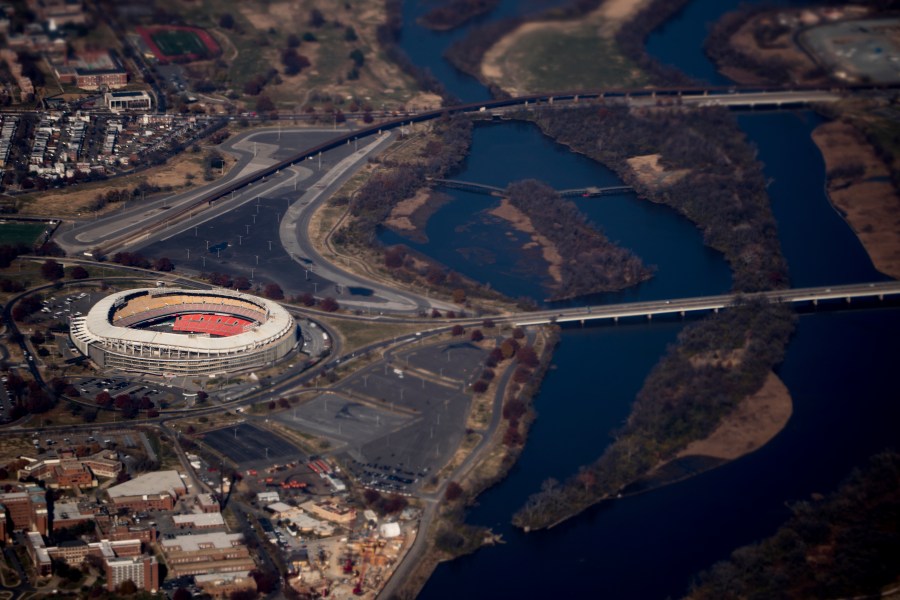 FILE - RFK Stadium is visible from Air Force One as it takes off from Andrews Air Force Base, Md., Wednesday, Nov. 29, 2017, as President Donald Trump flies to St. Louis to speak at a tax reform rally. (AP Photo/Andrew Harnik, File)