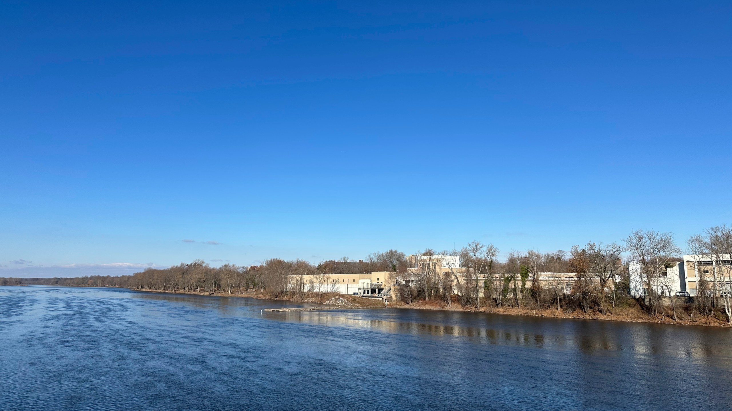 A Trenton, N.J. Water Works treatment facility is seen along the Delaware River on Dec. 3, 2024. (AP Photo/Mike Catalini)