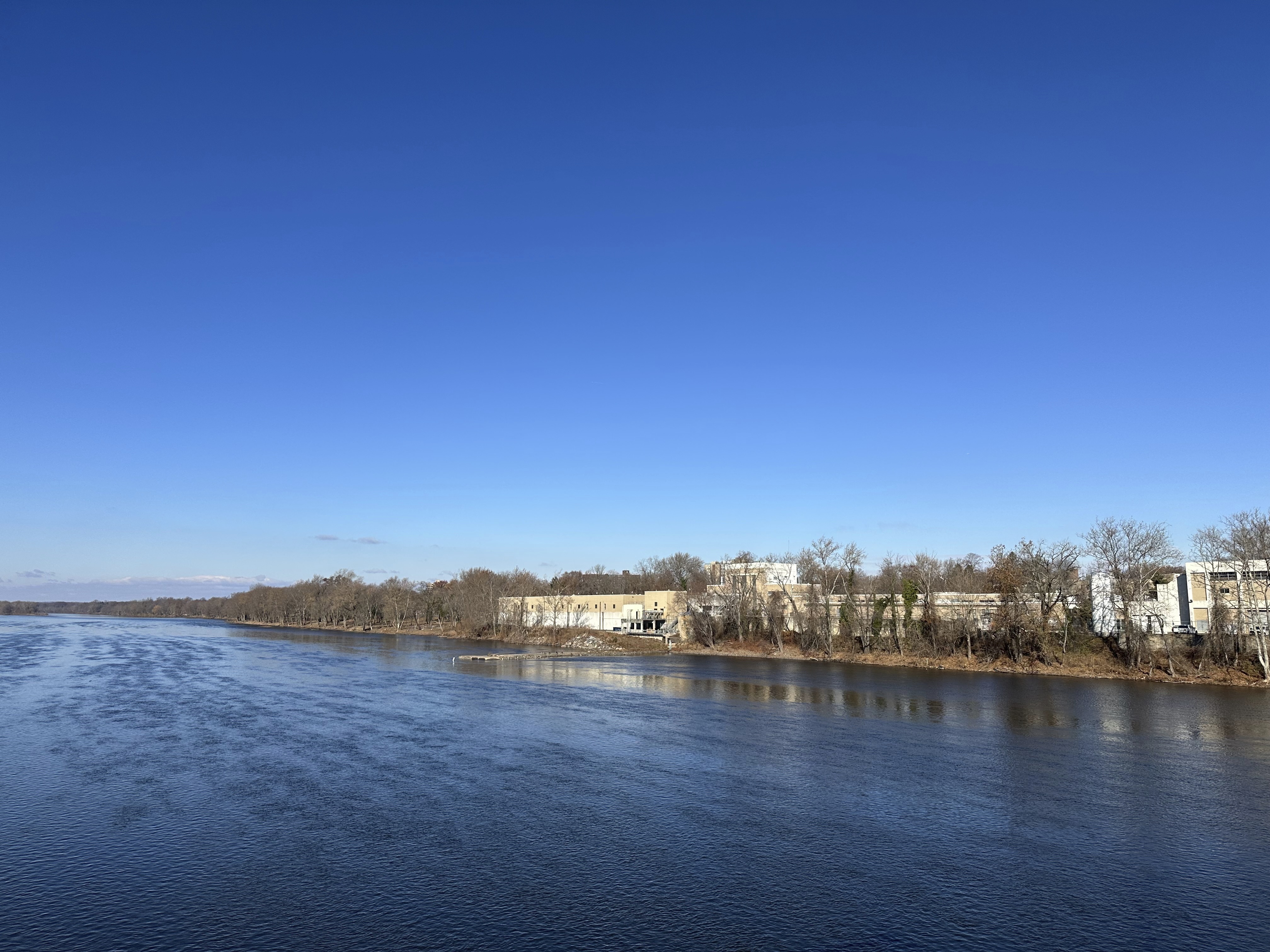 A Trenton, N.J. Water Works treatment facility is seen along the Delaware River on Dec. 3, 2024. (AP Photo/Mike Catalini)