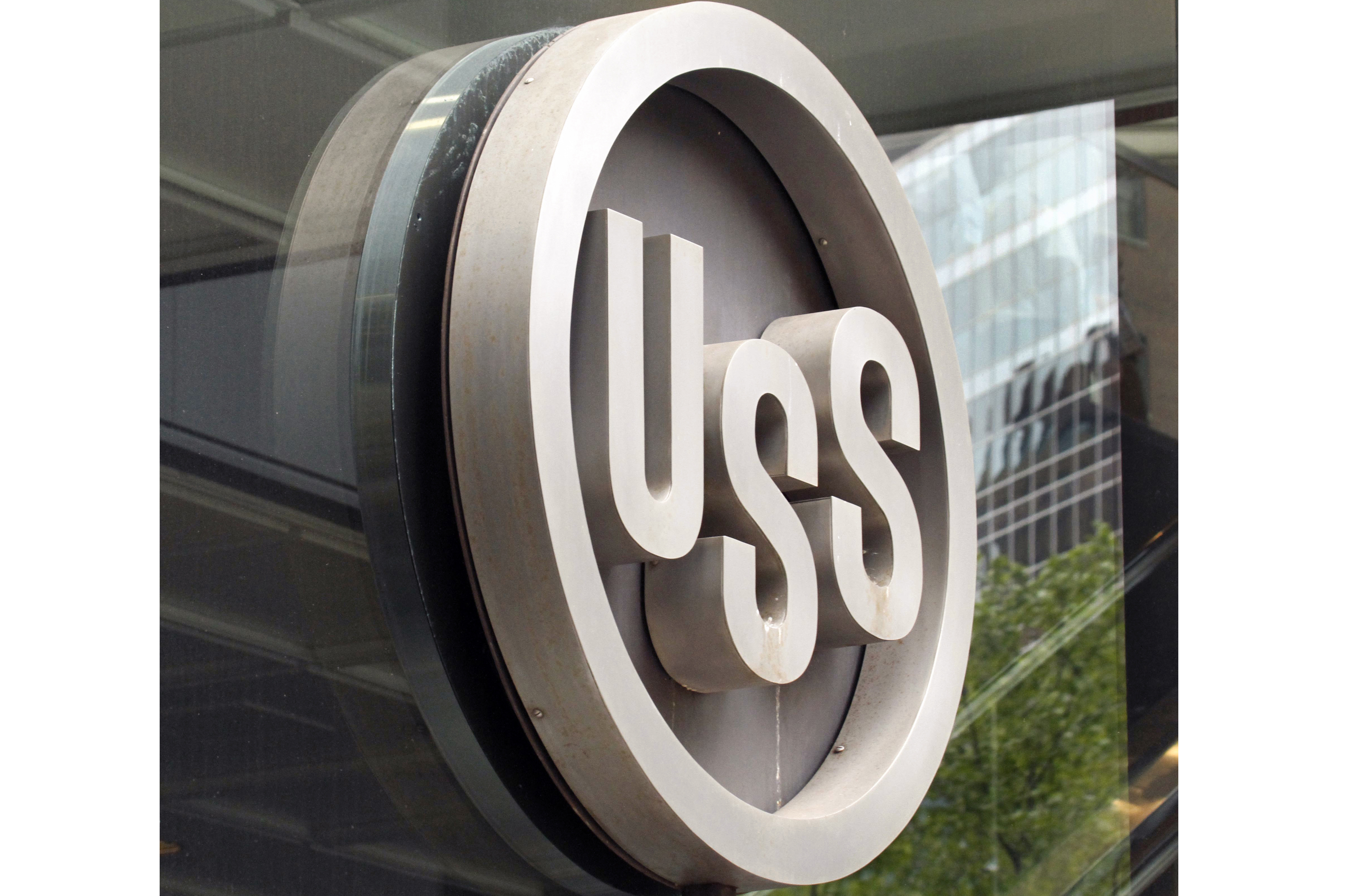 FILE - This April 26, 2010, file photo shows the United States Steel logo outside the headquarters building in downtown Pittsburgh. President-elect Donald Trump is underscoring his intention to block the purchase of U.S. Steel by Japanese steelmaker Nippon Steel Corp., and he’s pledging to use tax incentives and tariffs to strengthen the iconic American steelmaker. Trump said during the campaign that he would “instantaneously” block the deal, and he reiterated that sentiment in a Monday night statement.(AP Photo/Gene J. Puskar, File)