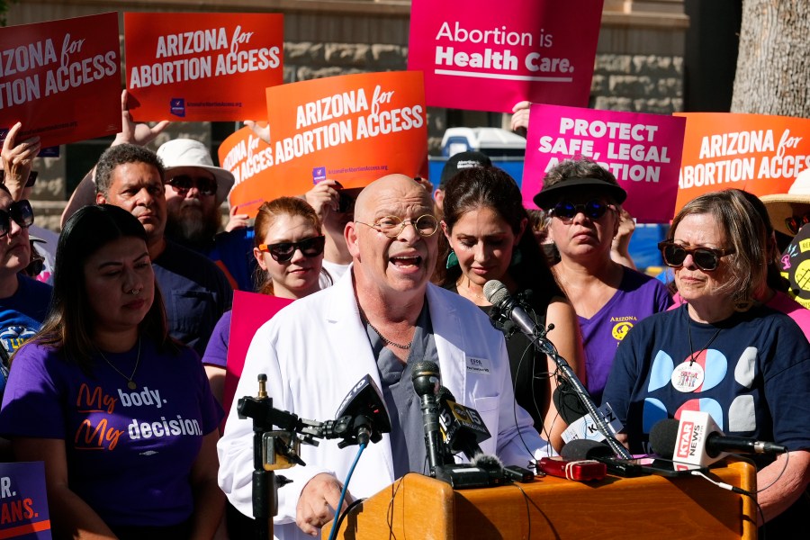 FILE - Dr. Paul Isaacson speaks as Arizona abortion-rights supporters gather for a news conference, July 3, 2024, in Phoenix. (AP Photo/Ross D. Franklin, file)