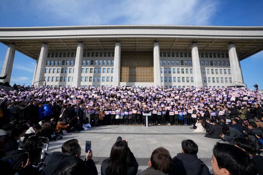 Members of main opposition Democratic Party stage a rally against South Korean President Yoon Suk Yeol at the National Assembly in Seoul, South Korea, Wednesday, Dec. 4, 2024. (AP Photo/Ahn Young-joon)