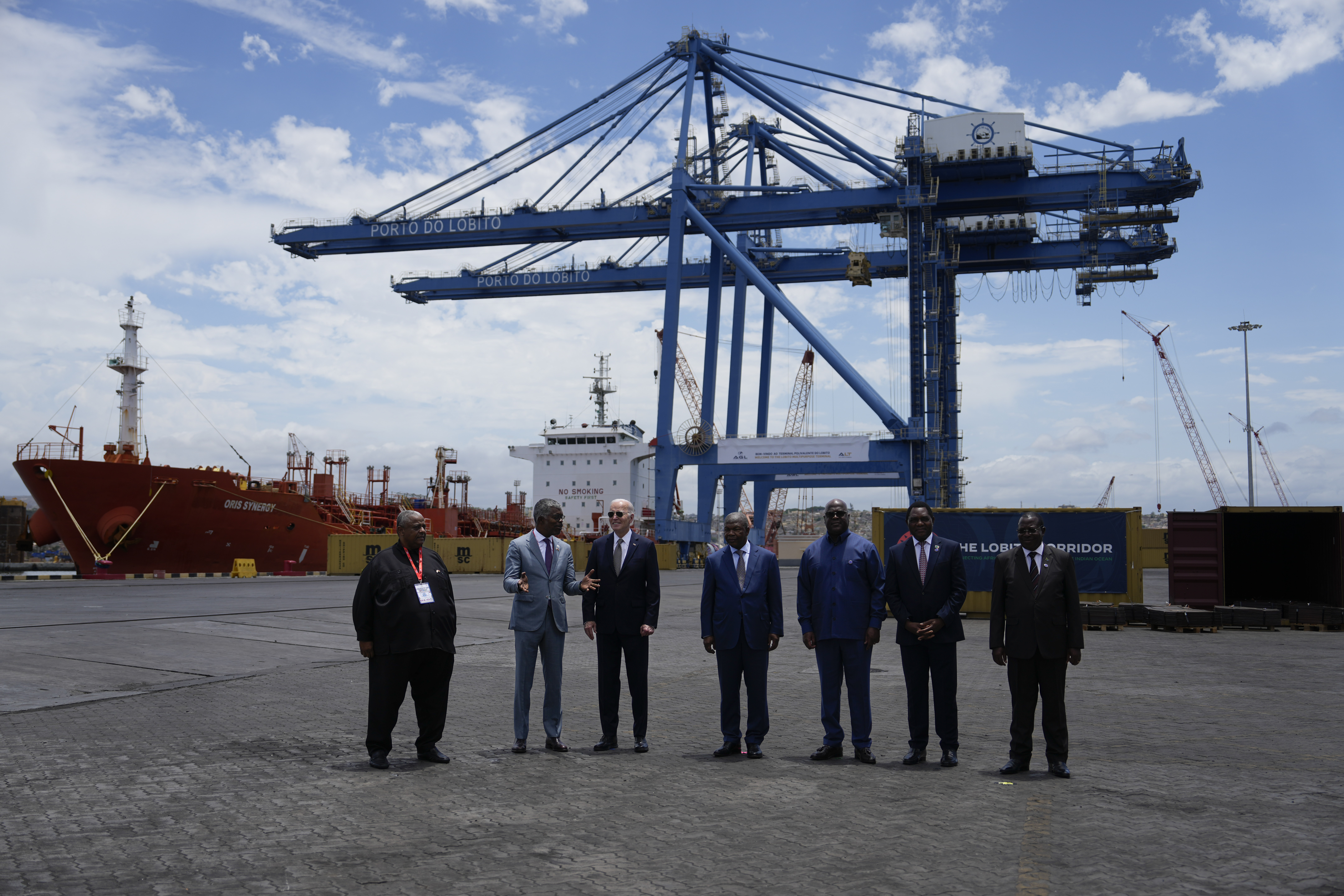 Angolan Minister of Transport Ricardo Daniel speaks to President Joe Biden accompanied by, from his left, President Joao Lourenco of the Republic of Angola, President Felix Tshisekedi of the Democratic Republic of the Congo, President Hakainde Hichilema of the Republic of Zambia and Vice President Philip Mpango of the United Republic of Tanzania during a tour of the Lobito Port Terminal, in Lobito, Angola, on Wednesday, Dec. 4, 2024. (AP Photo/Ben Curtis)