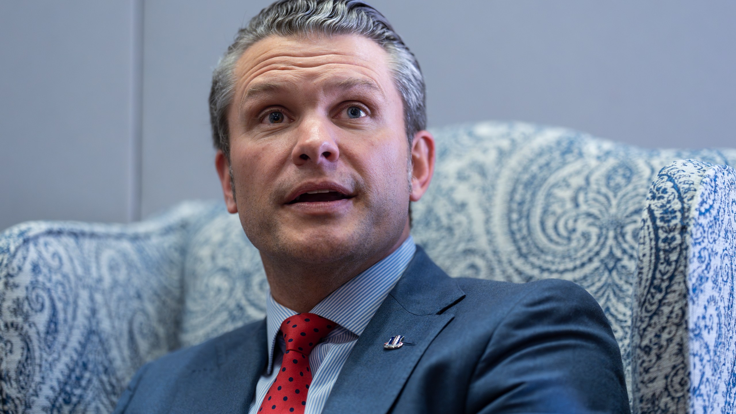 Pete Hegseth, President-elect Donald Trump's nominee to be defense secretary, responds to reporters during a meeting with Sen. Mike Rounds, R-S.D., a member of the Senate Armed Services Committee, at the Capitol in Washington, Thursday, Dec. 5, 2024. (AP Photo/J. Scott Applewhite)