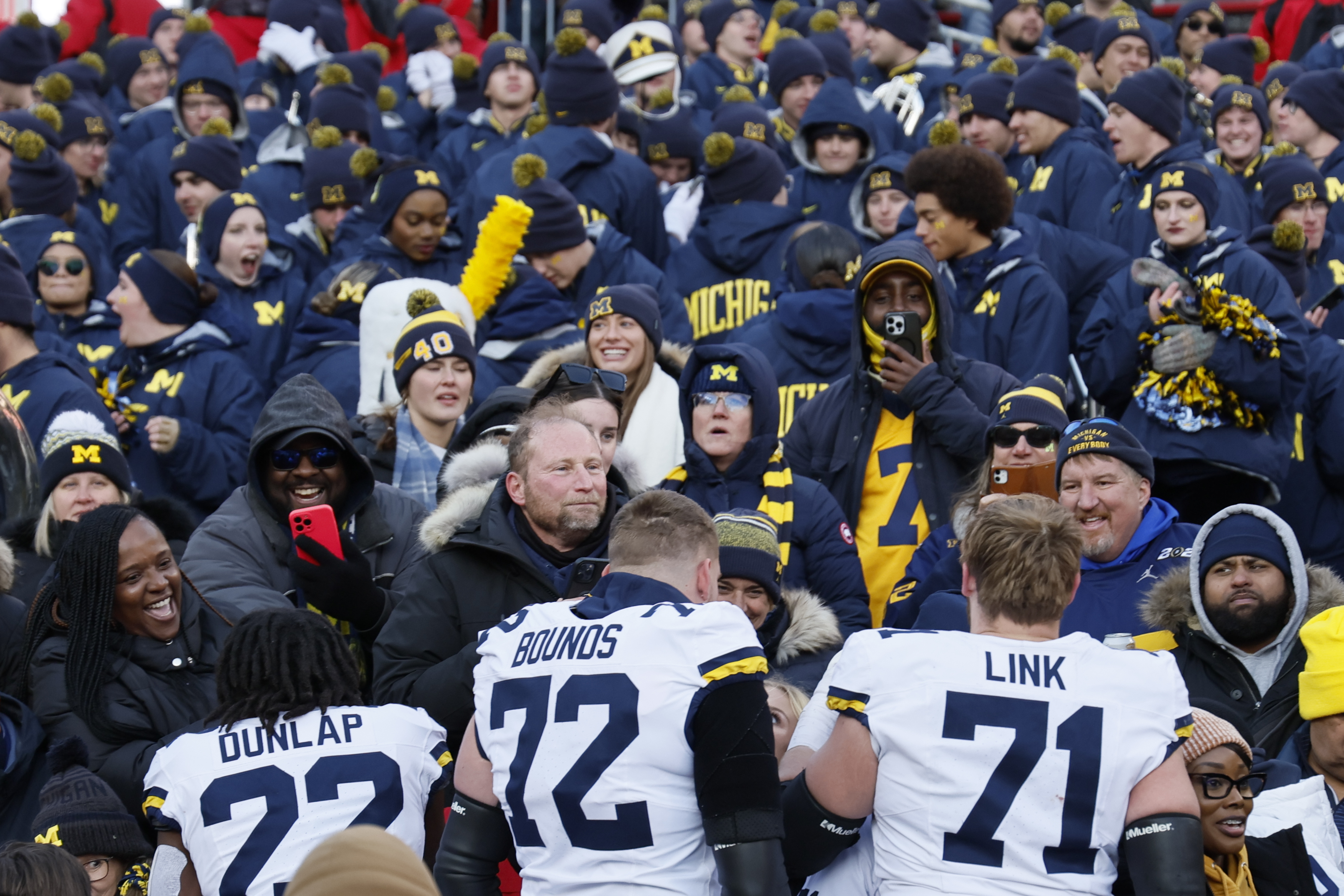 Michigan players celebrate their win over Ohio State in an NCAA college football game Saturday, Nov. 30, 2024, in Columbus, Ohio. (AP Photo/Jay LaPrete)