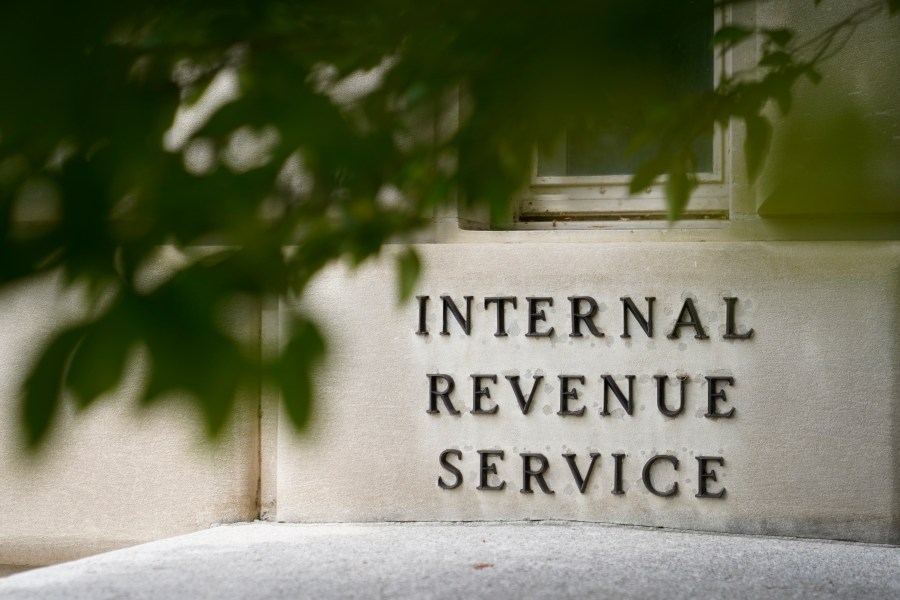 FILE - A sign is displayed outside the Internal Revenue Service building May 4, 2021, in Washington. On Friday, Aug. 19, 2022. (AP Photo/Patrick Semansky, File)