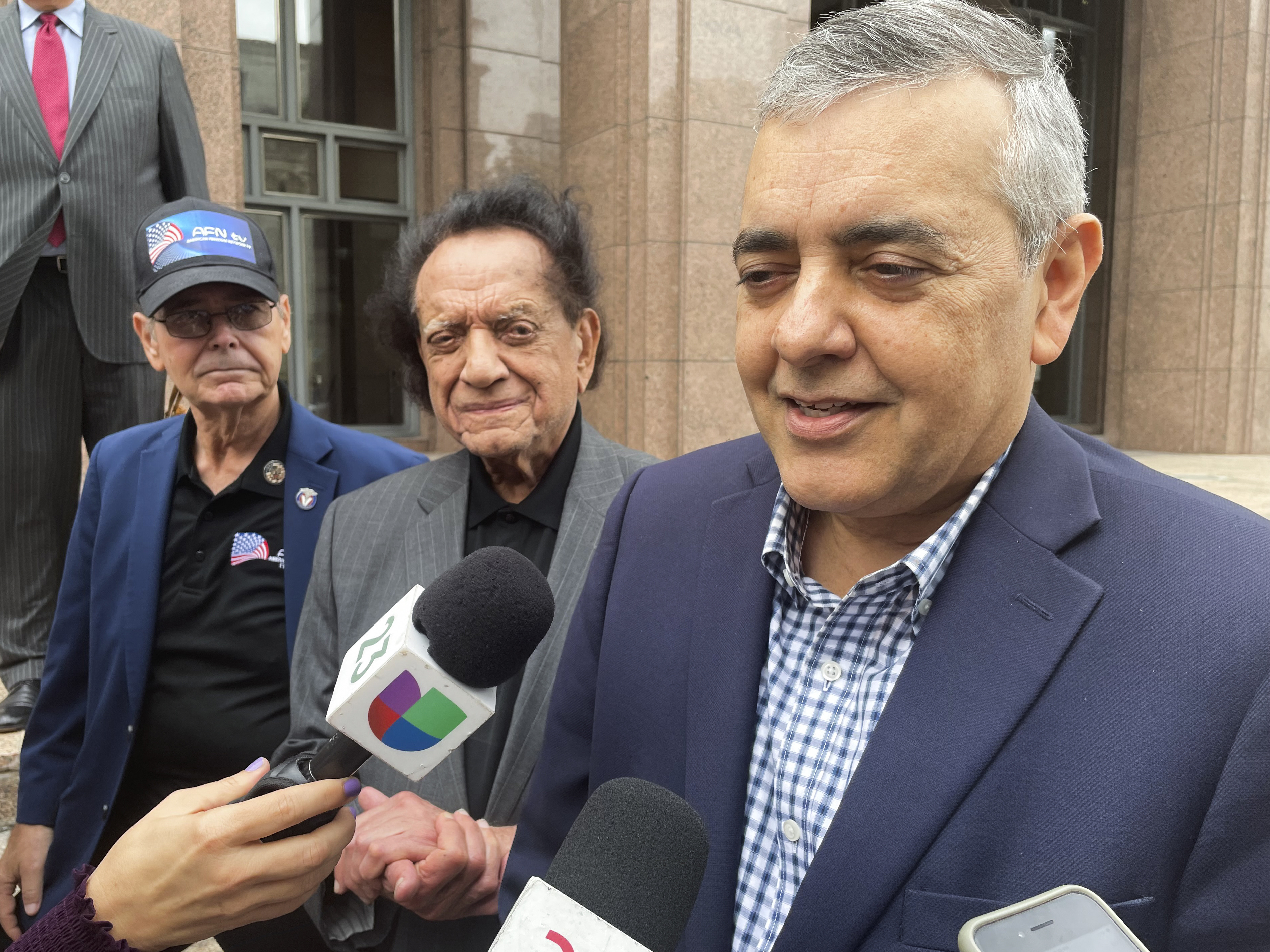 FILE - Former U.S. Rep. David Rivera speaks with media outside Miami federal court, in Miami, Dec. 20, 2022. (AP Photo/Joshua Goodman, File)