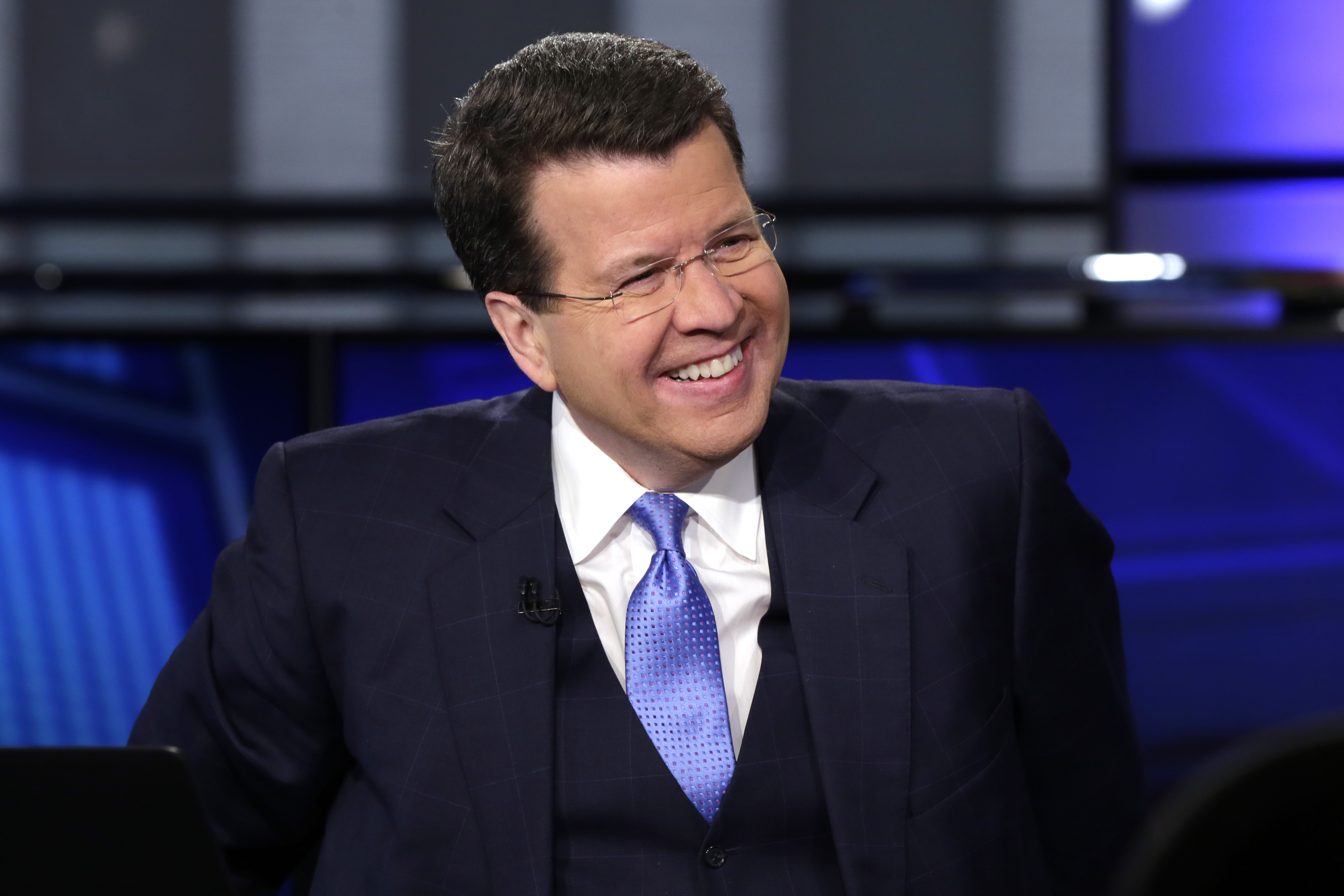 FILE - Anchor Neil Cavuto appears on the set of his "Cavuto: Coast to Coast" program, on the Fox Business Network, in New York on March 9, 2017. (AP Photo/Richard Drew, File)