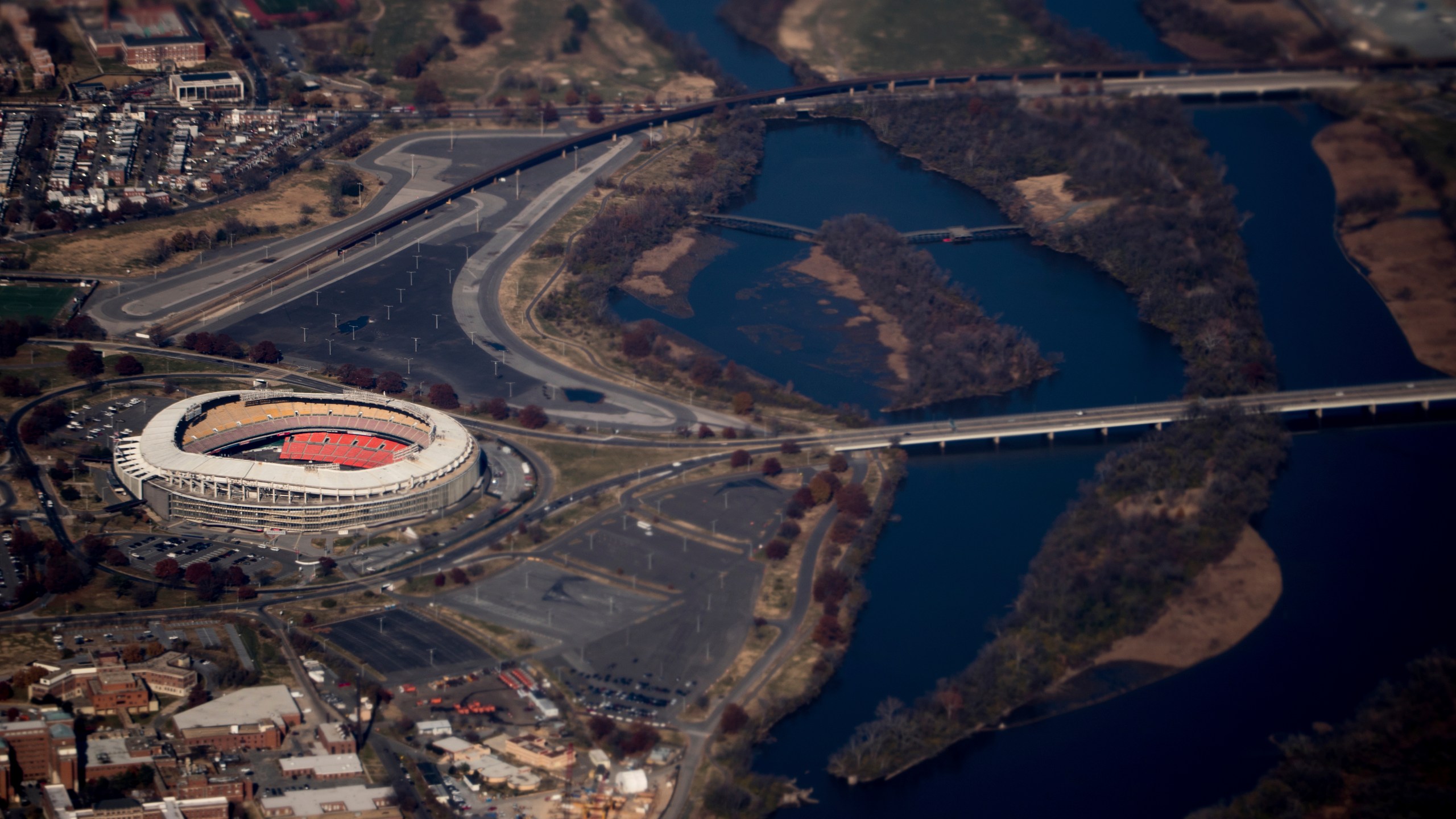 FILE - RFK Stadium is visible from Air Force One as it takes off from Andrews Air Force Base, Md., Wednesday, Nov. 29, 2017, as President Donald Trump flies to St. Louis to speak at a tax reform rally. (AP Photo/Andrew Harnik, File)