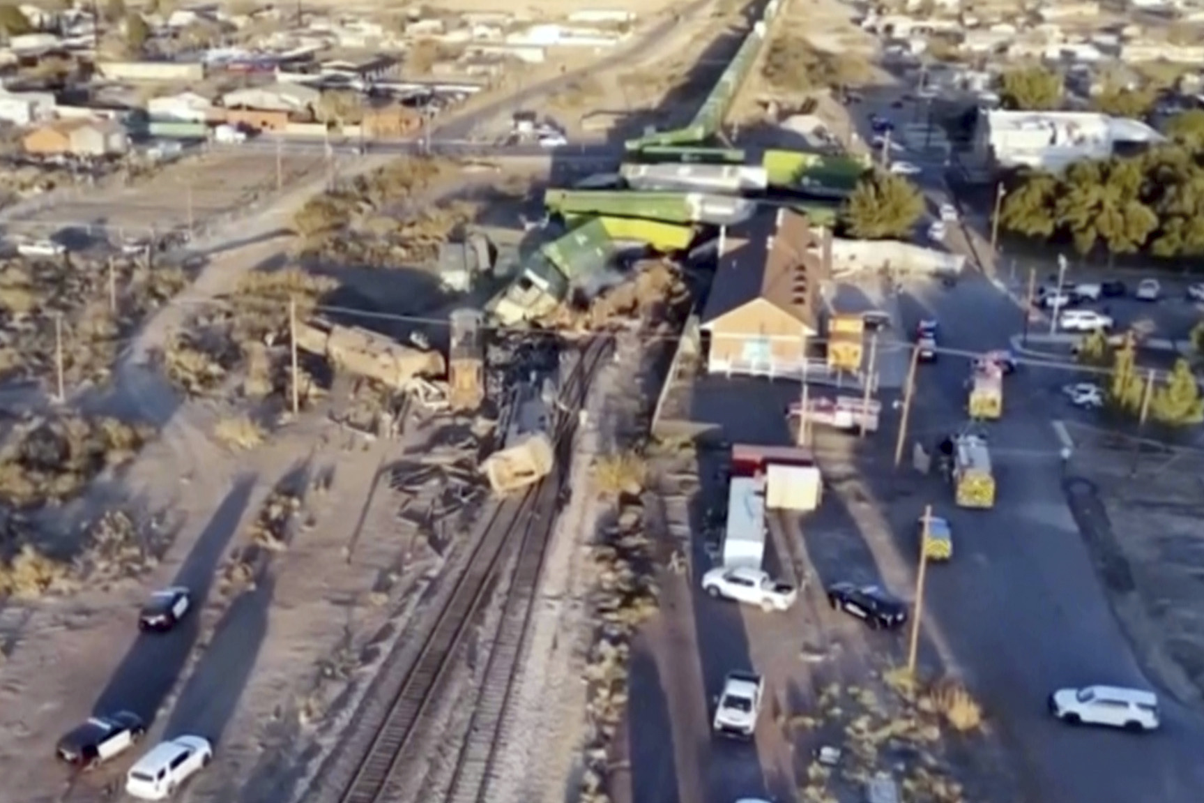 Damage to a train is seen at the site where a freight train collided with a tractor-trailer and derailed in Reeves County, Texas on Wednesday, 18, 2024. (Daniel Alvarado/Reeves County, Texas via AP)