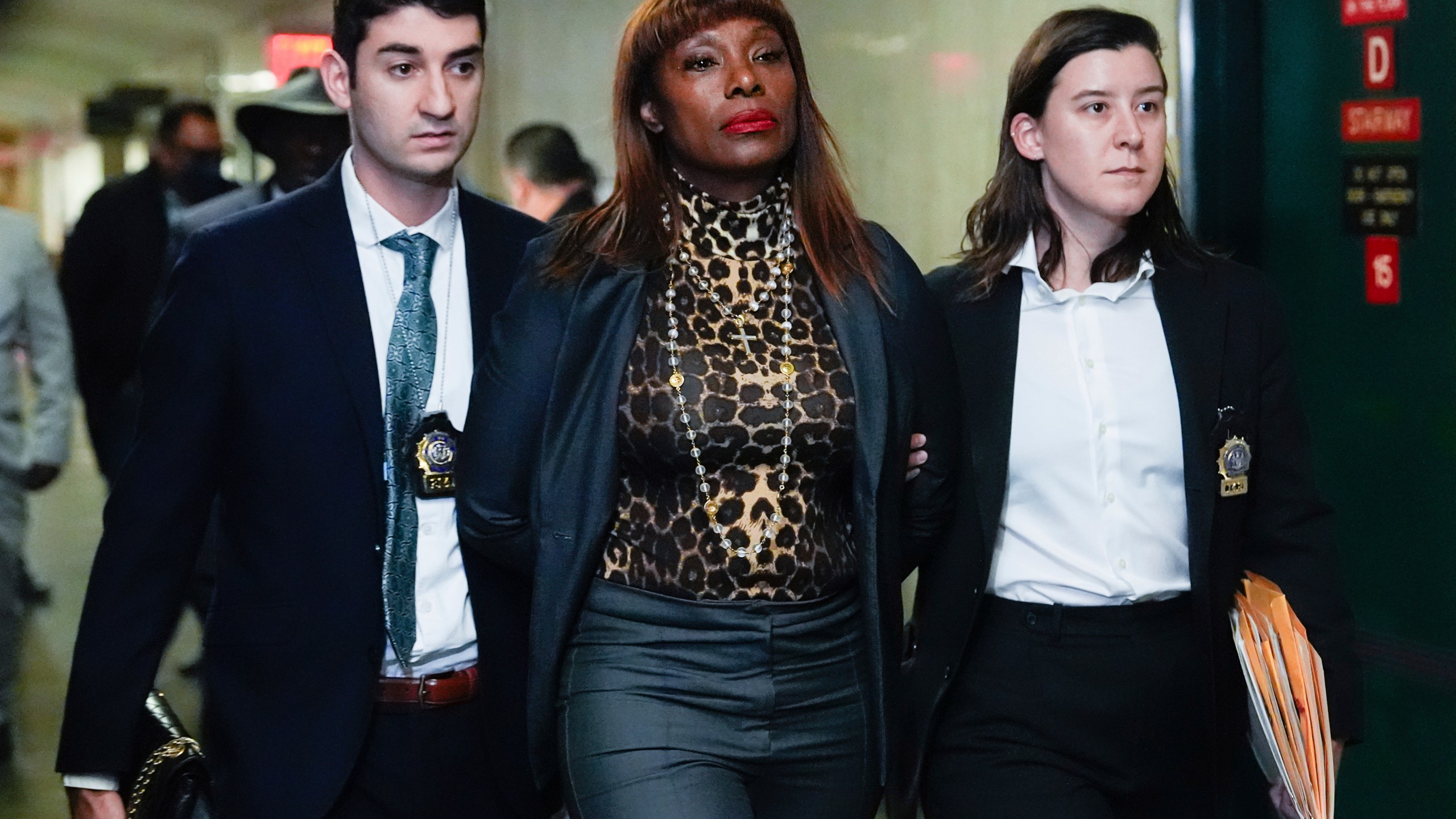 Ingrid Lewis-Martin is escorted into Manhattan criminal court, Thursday, Dec. 19, 2024, in New York. (AP Photo/Julia Demaree Nikhinson)