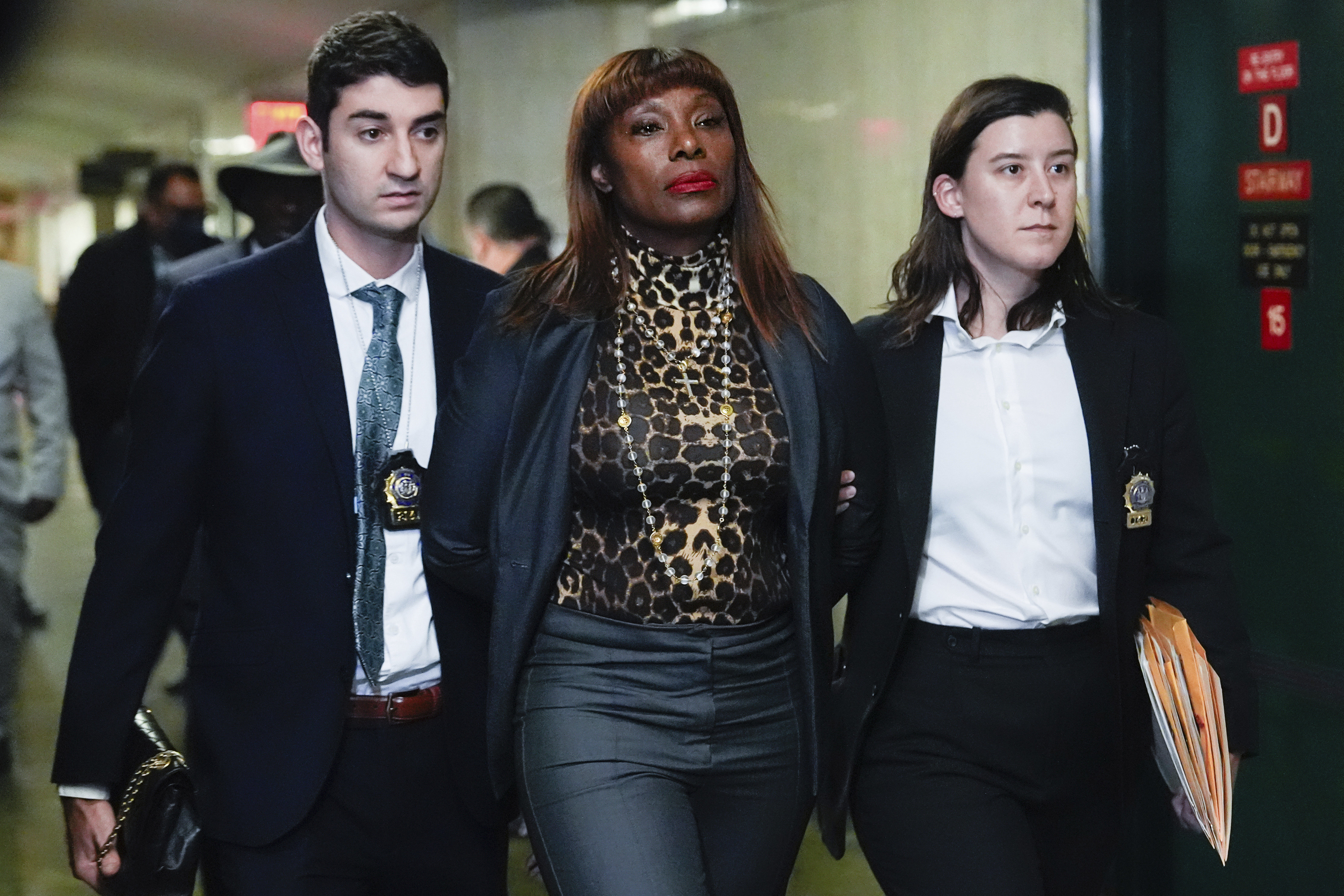 Ingrid Lewis-Martin is escorted into Manhattan criminal court, Thursday, Dec. 19, 2024, in New York. (AP Photo/Julia Demaree Nikhinson)