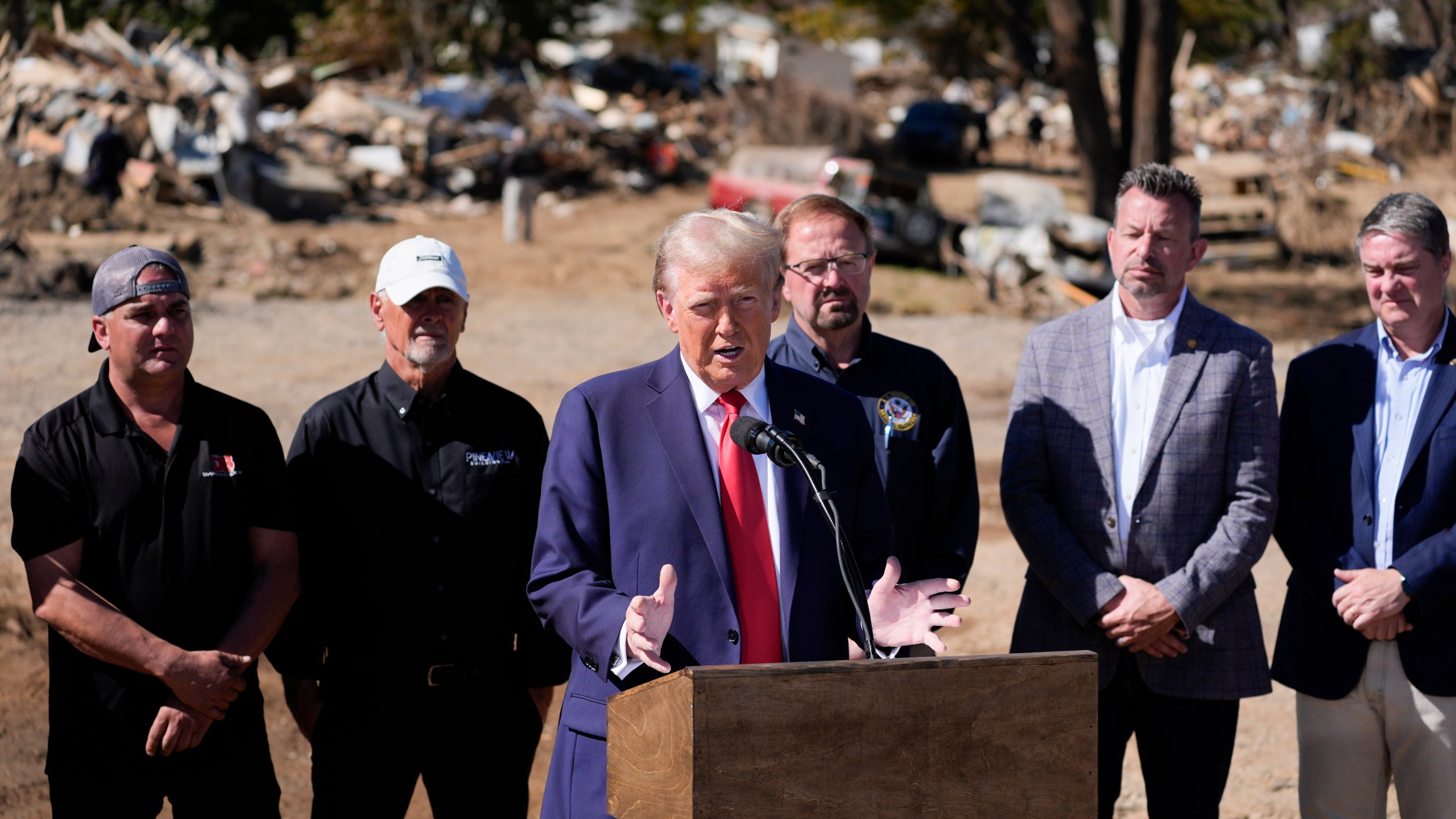 FILE - Republican presidential nominee former President Donald Trump delivers remarks on the damage and federal response to Hurricane Helene, in Swannanoa, N.C., Oct. 21, 2024. (AP Photo/Evan Vucci, File)