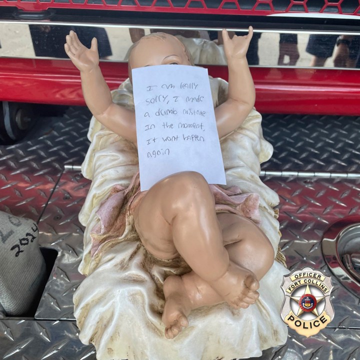 This photo provided by the Fort Collins, Colo., Police shows a note on a baby Jesus figurine snatched from a nativity scene, after it was dropped off anonymously at a fire station Thursday, Dec. 19, 2024, police said. (Fort Collins Police via AP)