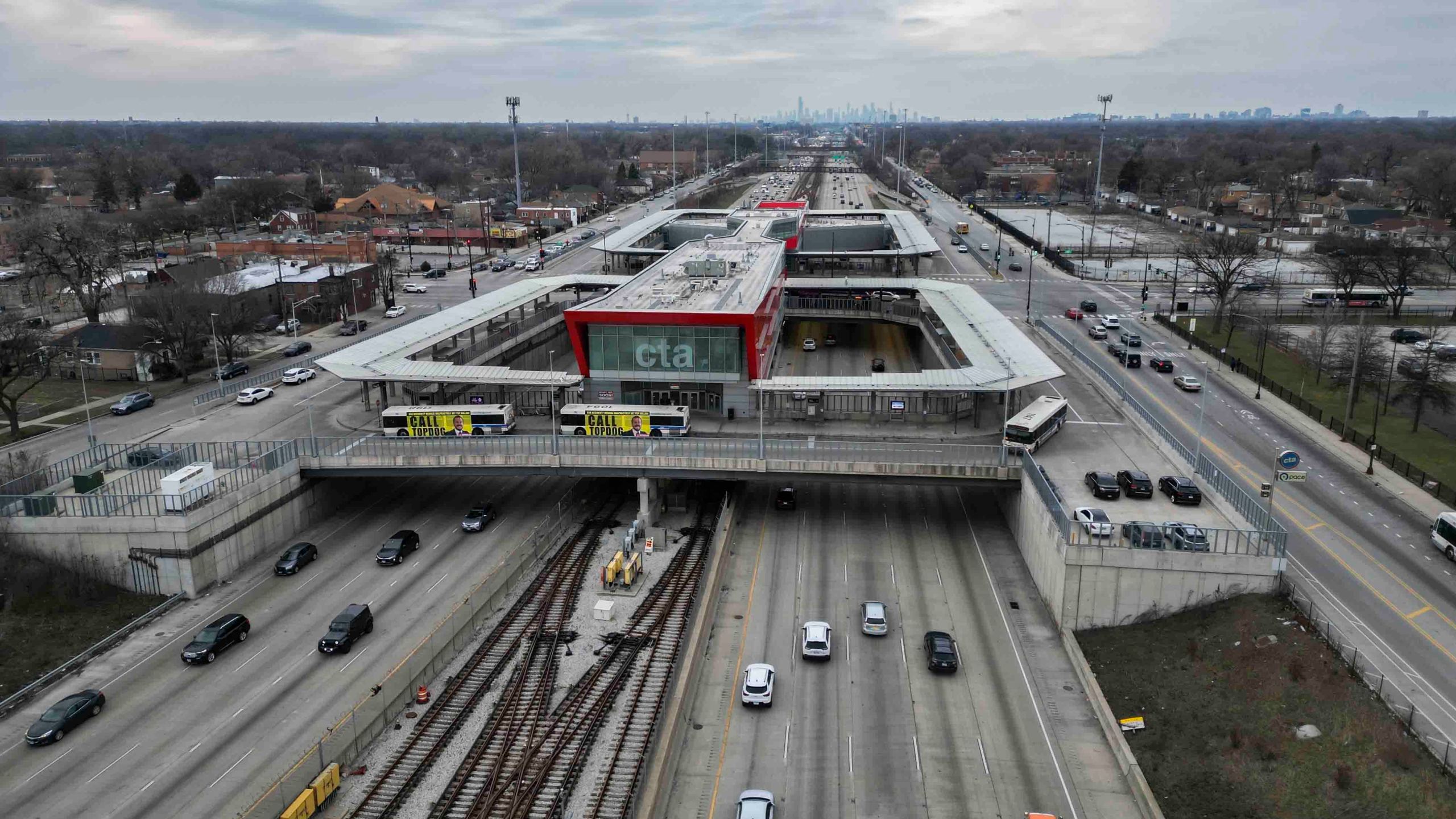 Cars pass the 95th Street Red Line Station, the train station currently the farthest south on the line and where the Chicago Transit Authority plans to extend from in 2025, Thursday, Dec. 19, 2024, in Chicago. (AP Photo/Erin Hooley)