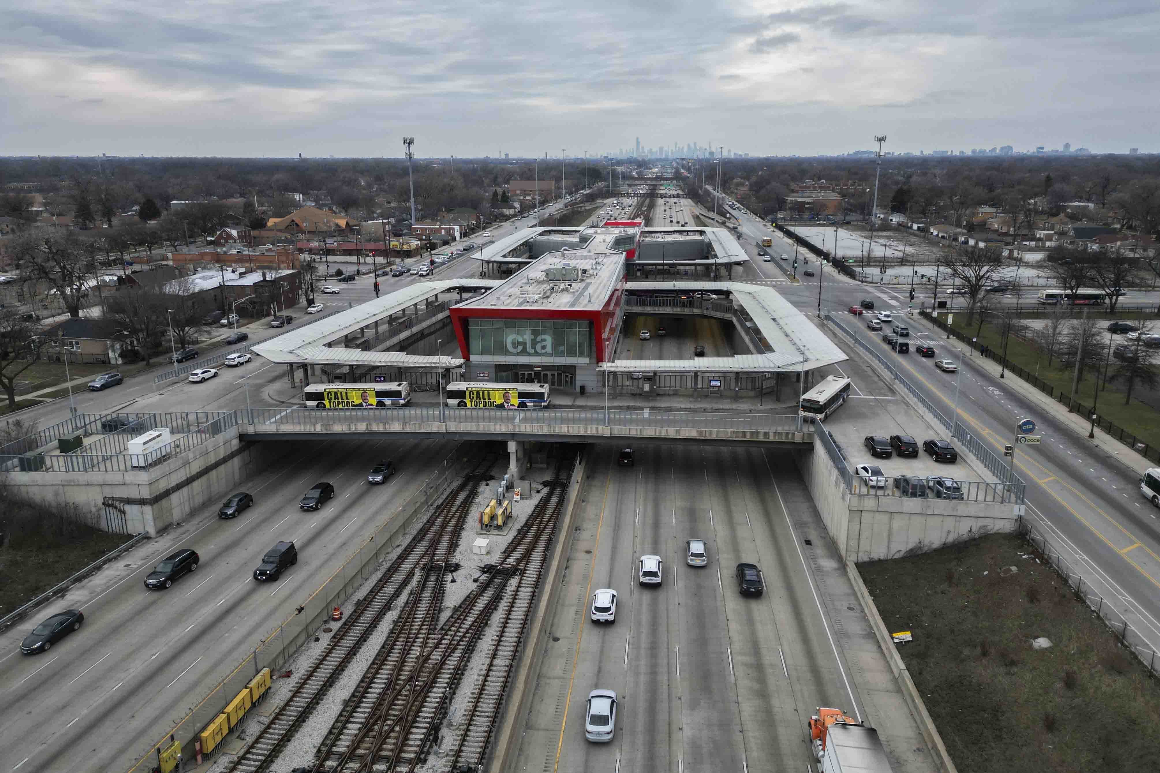 Cars pass the 95th Street Red Line Station, the train station currently the farthest south on the line and where the Chicago Transit Authority plans to extend from in 2025, Thursday, Dec. 19, 2024, in Chicago. (AP Photo/Erin Hooley)