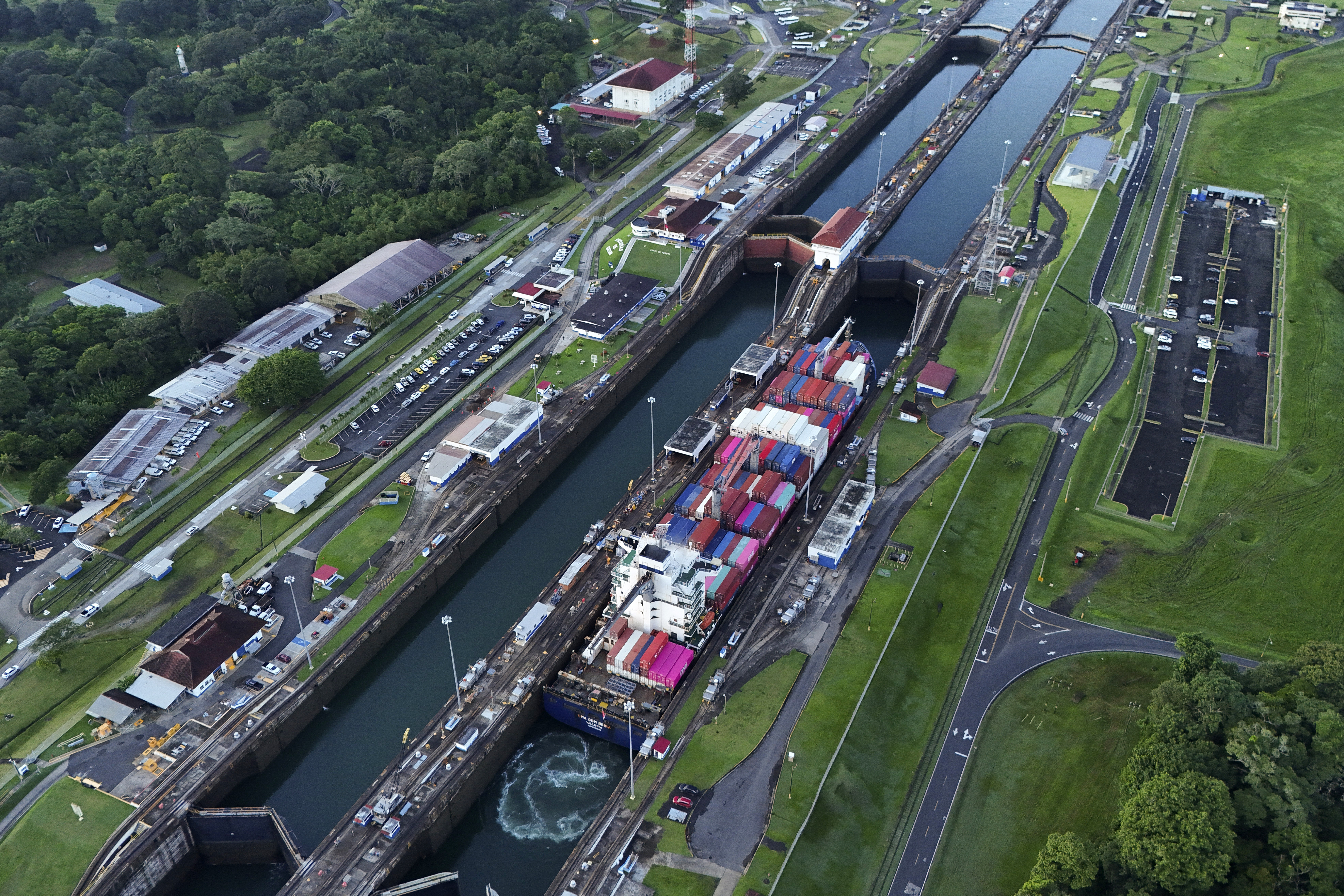 FILE - A cargo ship traverses the Agua Clara Locks of the Panama Canal in Colon, Panama, Sept. 2, 2024. (AP Photo/Matias Delacroix, File)