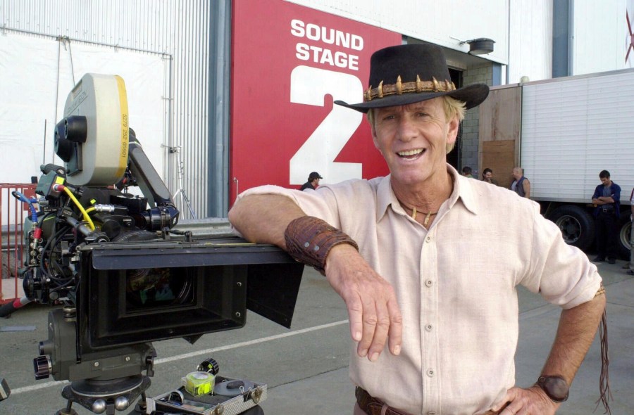 FILE - Actor Paul Hogan stands on the set of "Crocodile Dundee in Los Angeles" on the Gold Coast, Australia Tuesday Aug. 29, 2000. (AP Photo/Steve Holland, File)