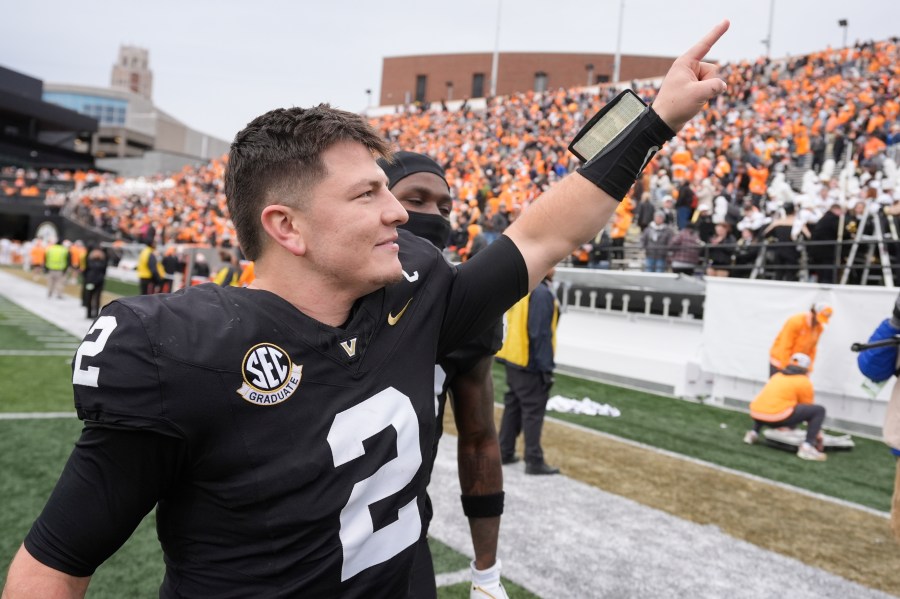 Vanderbilt quarterback Diego Pavia (2) waves to fans as he leaves the field after an NCAA college football game against Tennessee Saturday, Nov. 30, 2024, in Nashville, Tenn. Tennessee won 36-23. (AP Photo/George Walker IV)