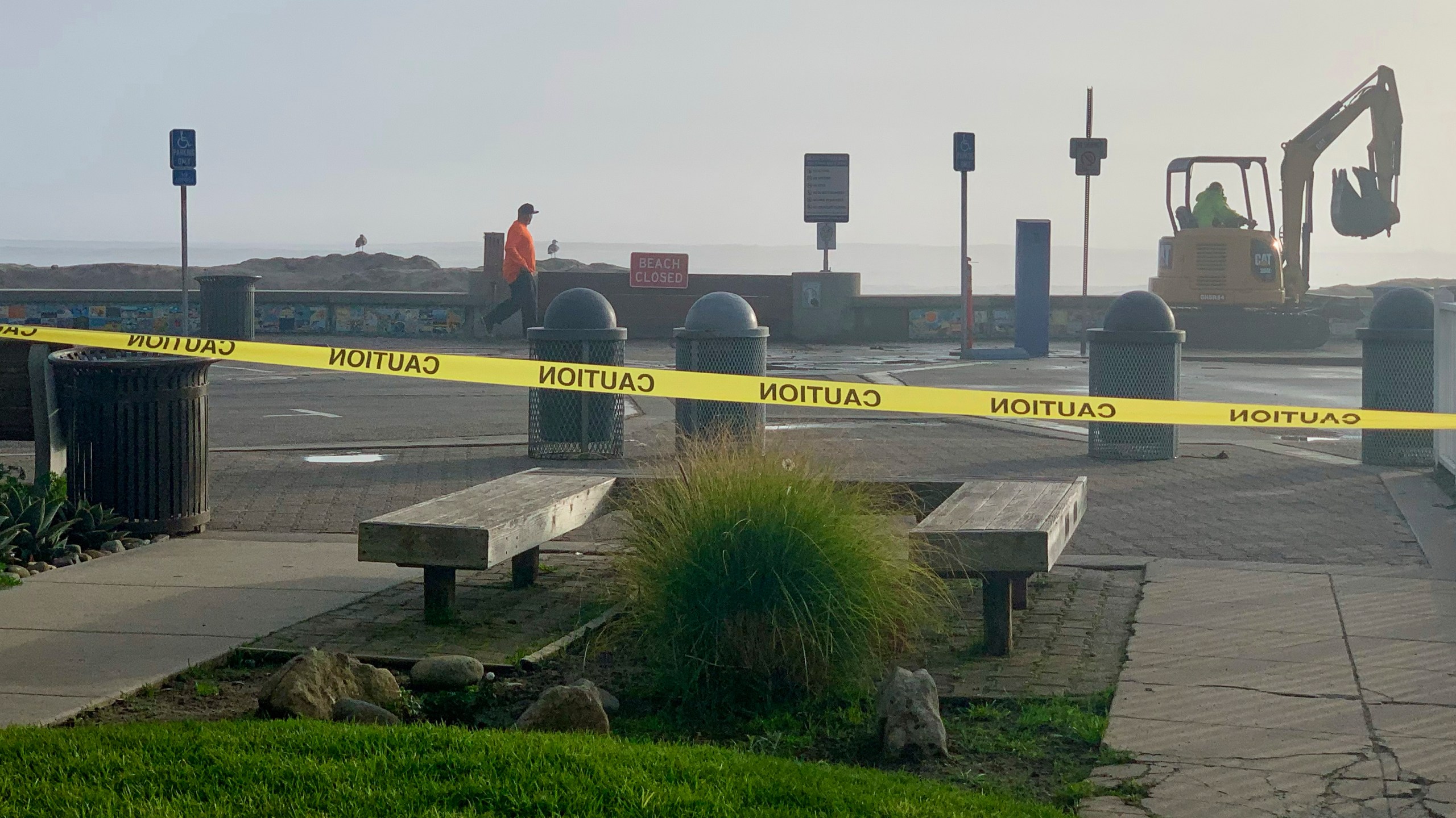 Caution tape closes Capitola Beach due to high surf on Monday, Dec. 23, 2024, in Capitola, Calif. (AP Photo/Pamela Hassell)